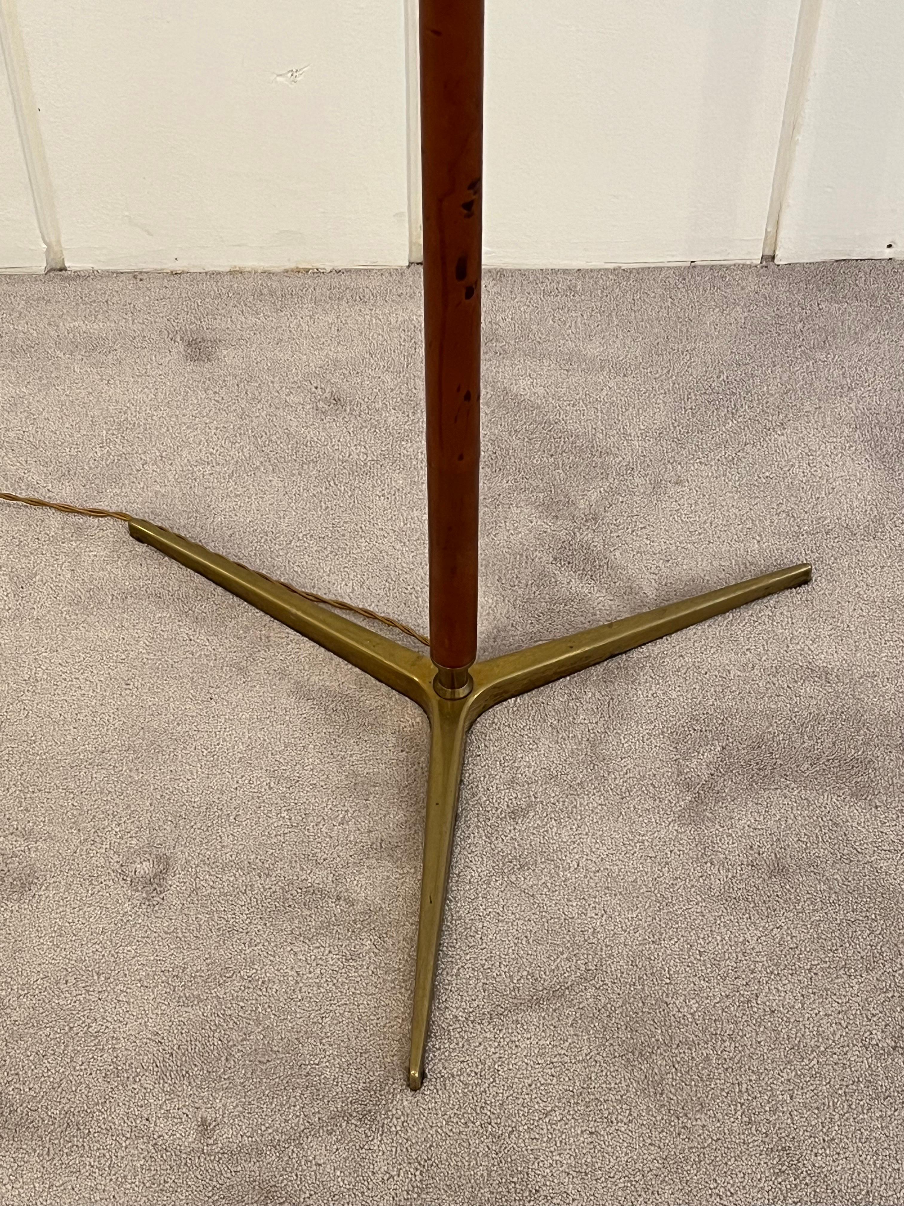 Midcentury Italian tubular brass and wrapped in leather tripod floor lamp
Designed by Gino Sarfatti 
circa 1946/48
Brand New Shade 
Original condition.