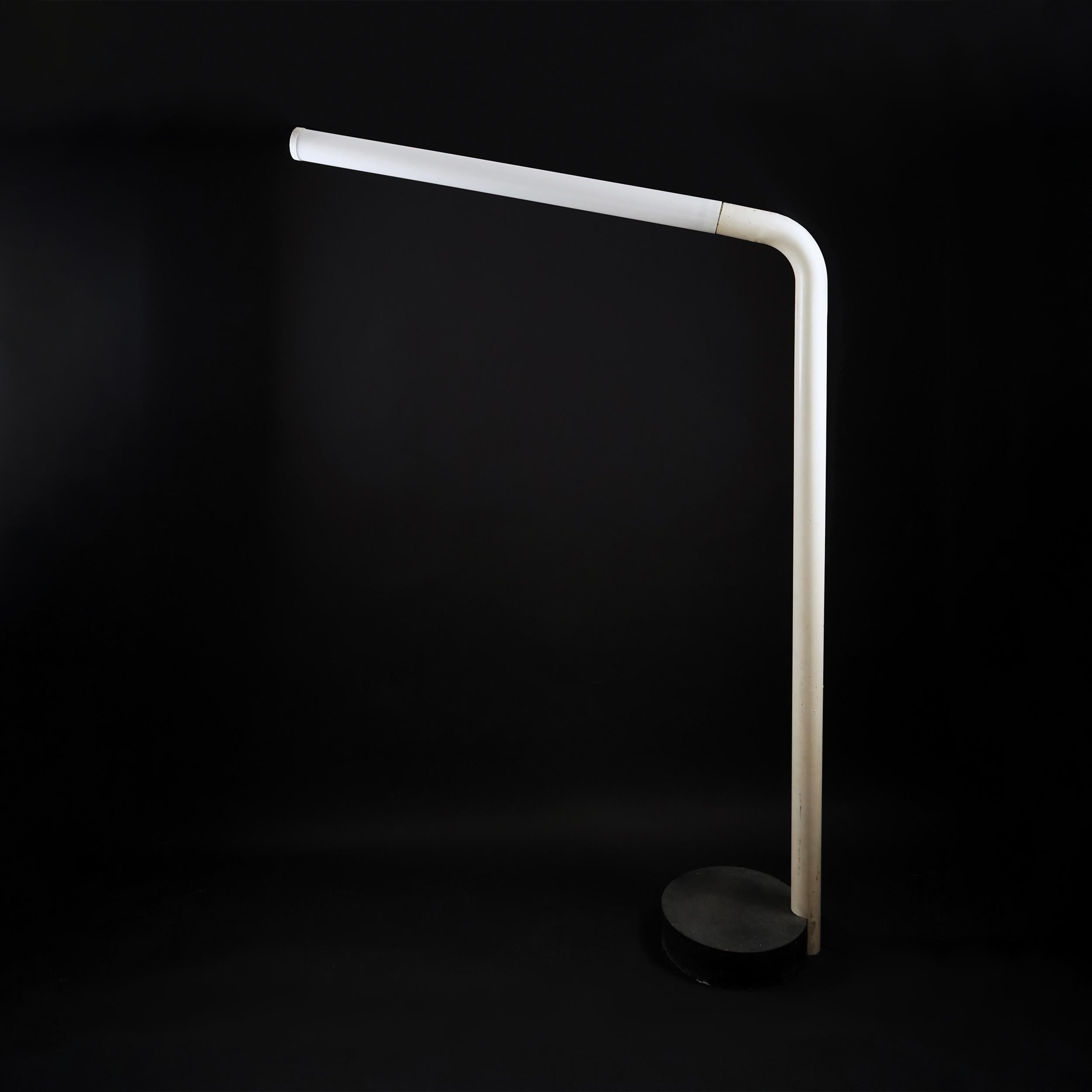 Floor lamp, 1967s, Italy, white metal painted and neon
Circular black base cm 38 in metal painted
Total height cm 170 of the metal part painted in white
Length of the neon part cm 130 the part of the light.
  