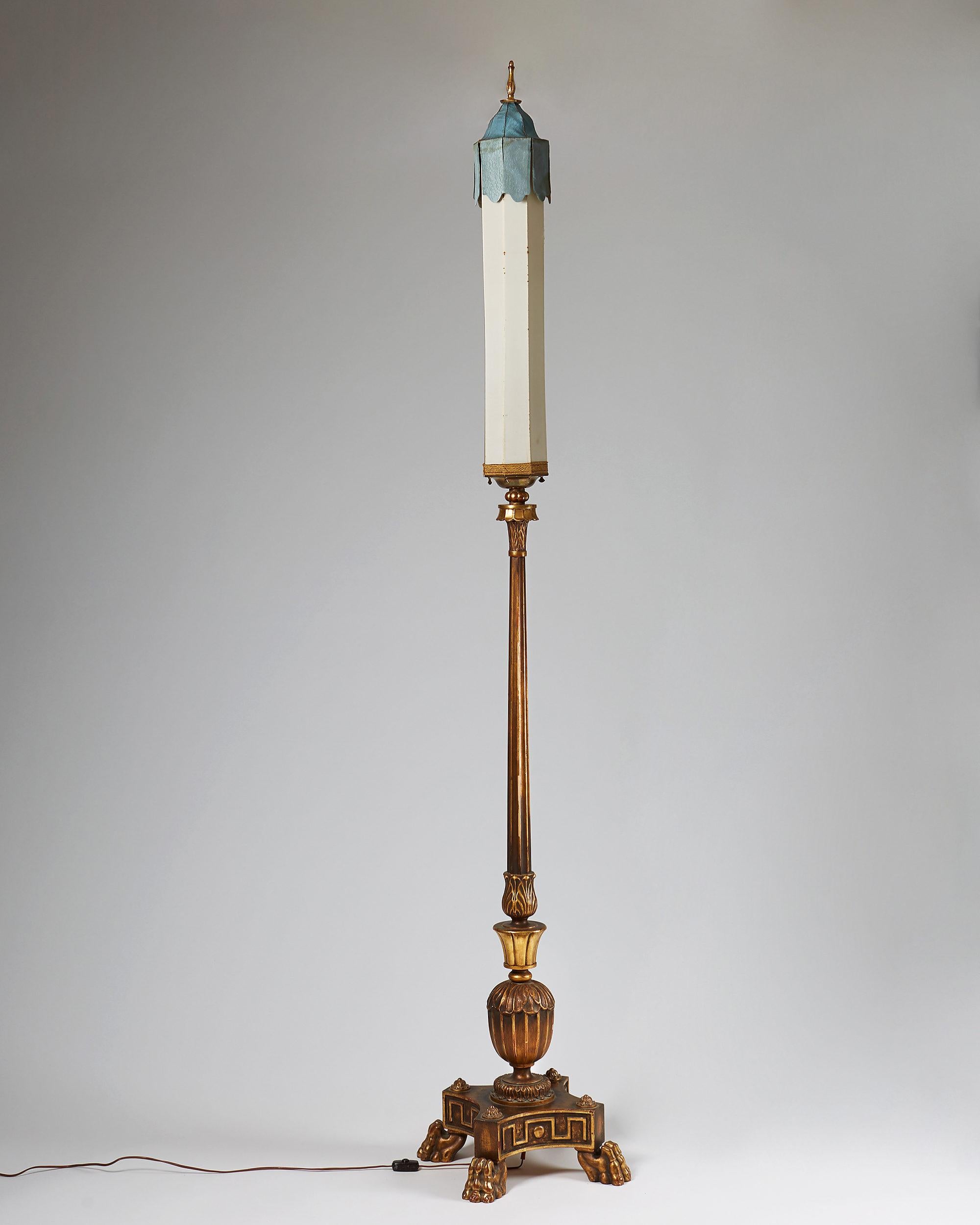 emile rattan and polished brass floor lamp