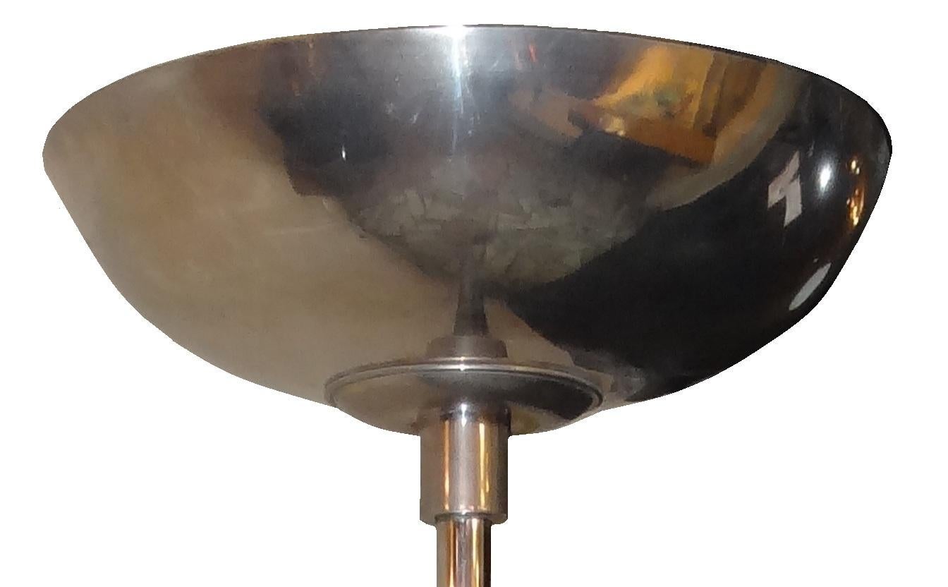 Floor lamp Art Deco

Material: chrome 
German
1920
You want to live in the golden years, those are the floor lamps that your project needs.
We have specialized in the sale of Art Deco and Art Nouveau styles since 1982.
Pushing the button that reads