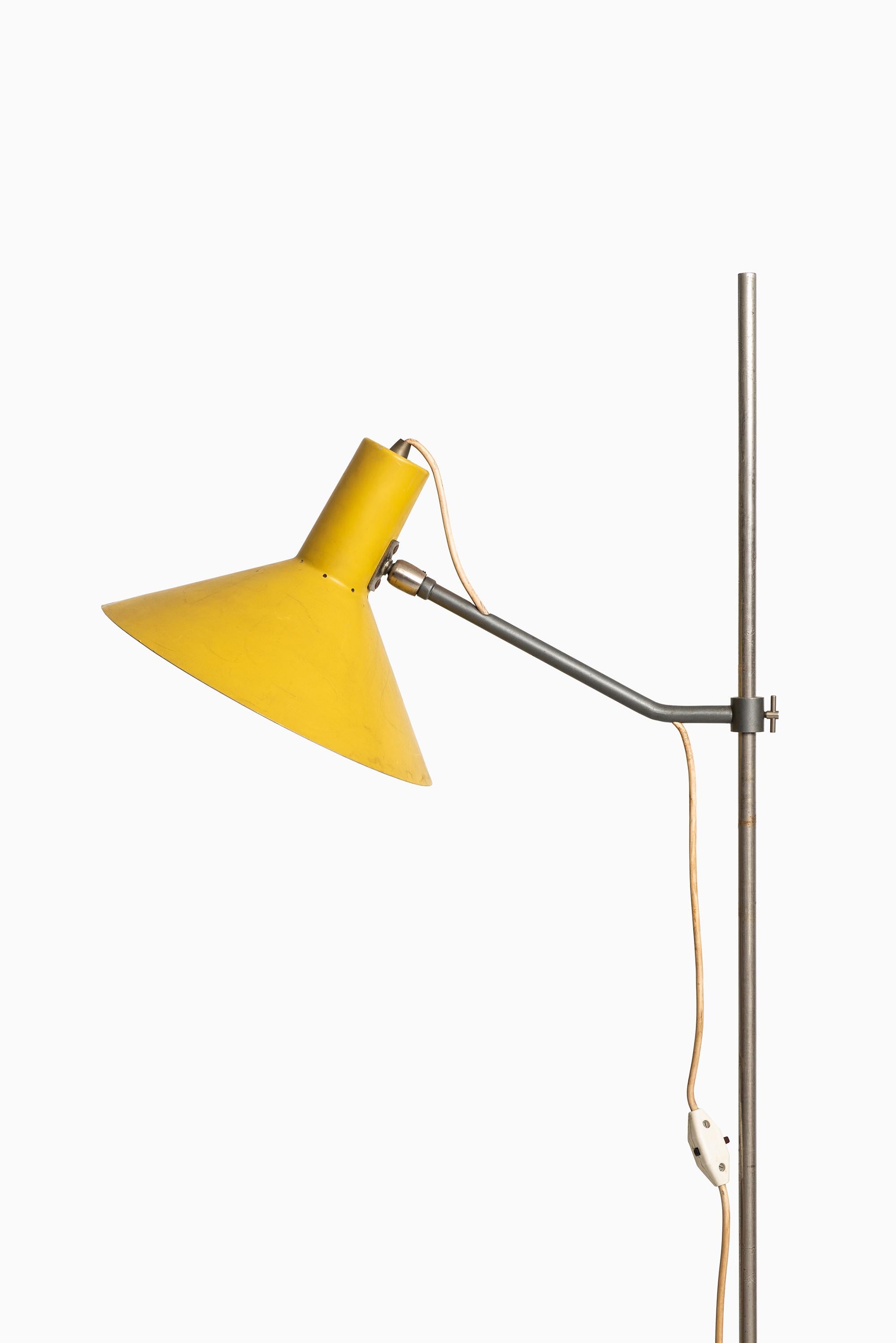 Height adjustable floor lamp attributed to Wim Rietveld. Probably produced by Gispen in Netherlands.