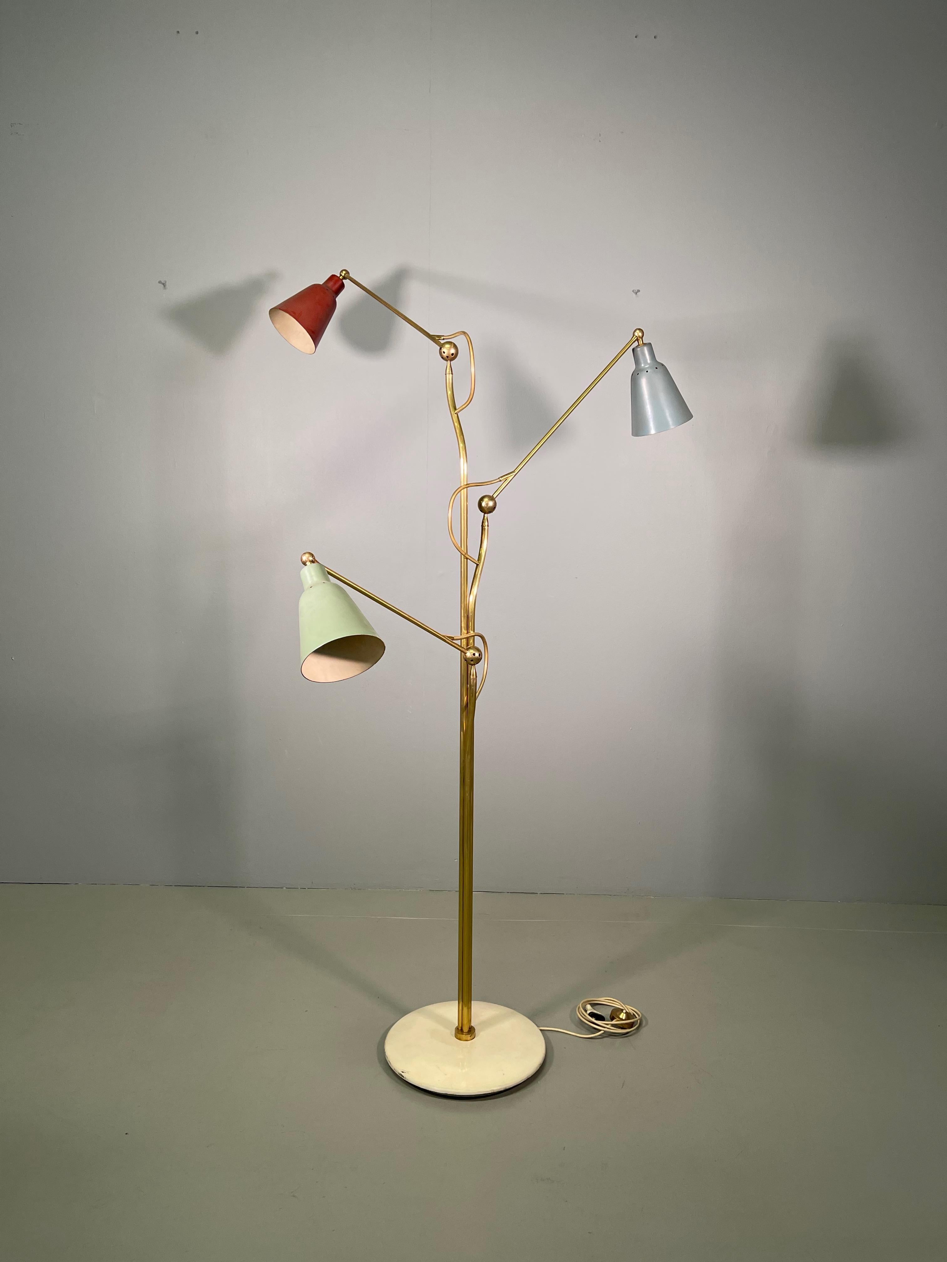 Angelo Lelii for Arredoluce, floor lamp, metal, brass, Italy, 1950s 
This iconic floor lamp was designed by Angelo Lelli and manufactured by Arredoluce, Italy in 1950. 
This lamp was a symbol of the 1950s, due to its fixtures. It was designed in