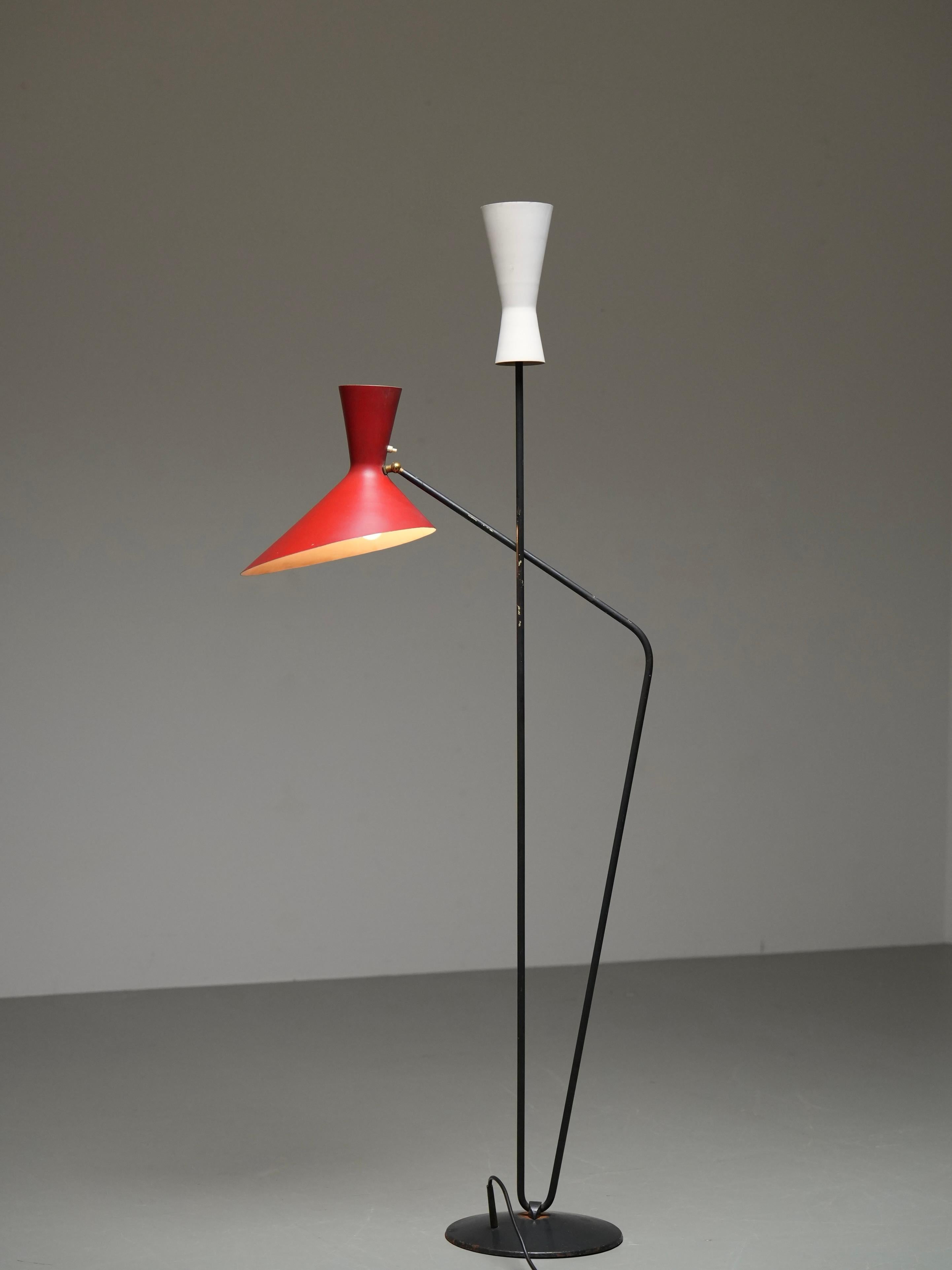Floor Lamp by Carl Moor for BAG Turgi in Metal and Brass, Switzerland, 1950's

A well designed  floor lamp by Swiss designer and Professor Carl Moor, produced by BAG Turgi in the 1950's. 

The lamp features two Diabolo-shaped metal shades, one in