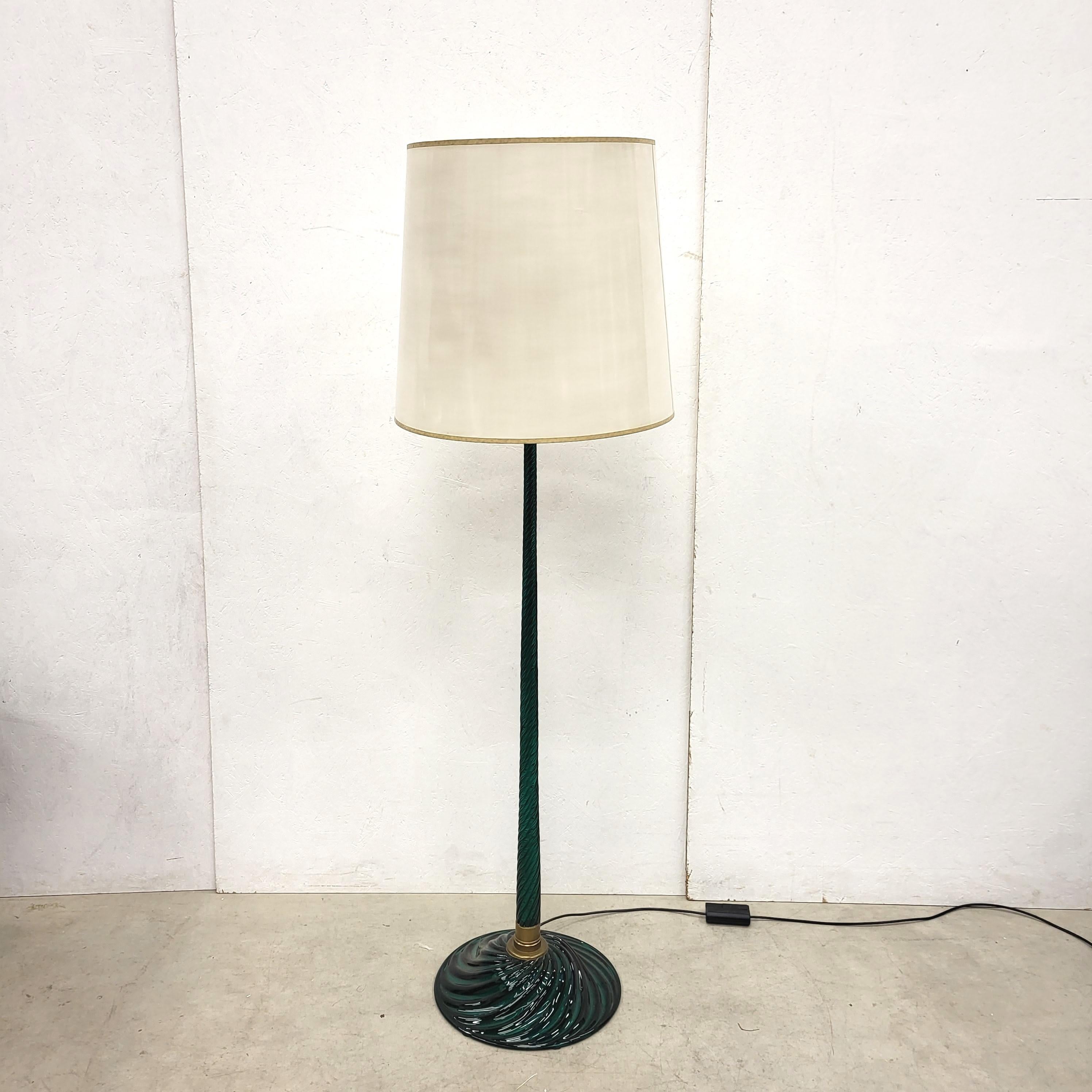 Rare floor lamp by Carlo Scarpa for Venini, Italy in the 1940s.

Very fine piece which was made overall from finest Murano-Glass.
Stunning Aquamarine green-blue colour.

The lamp is in a very good condition!.
 