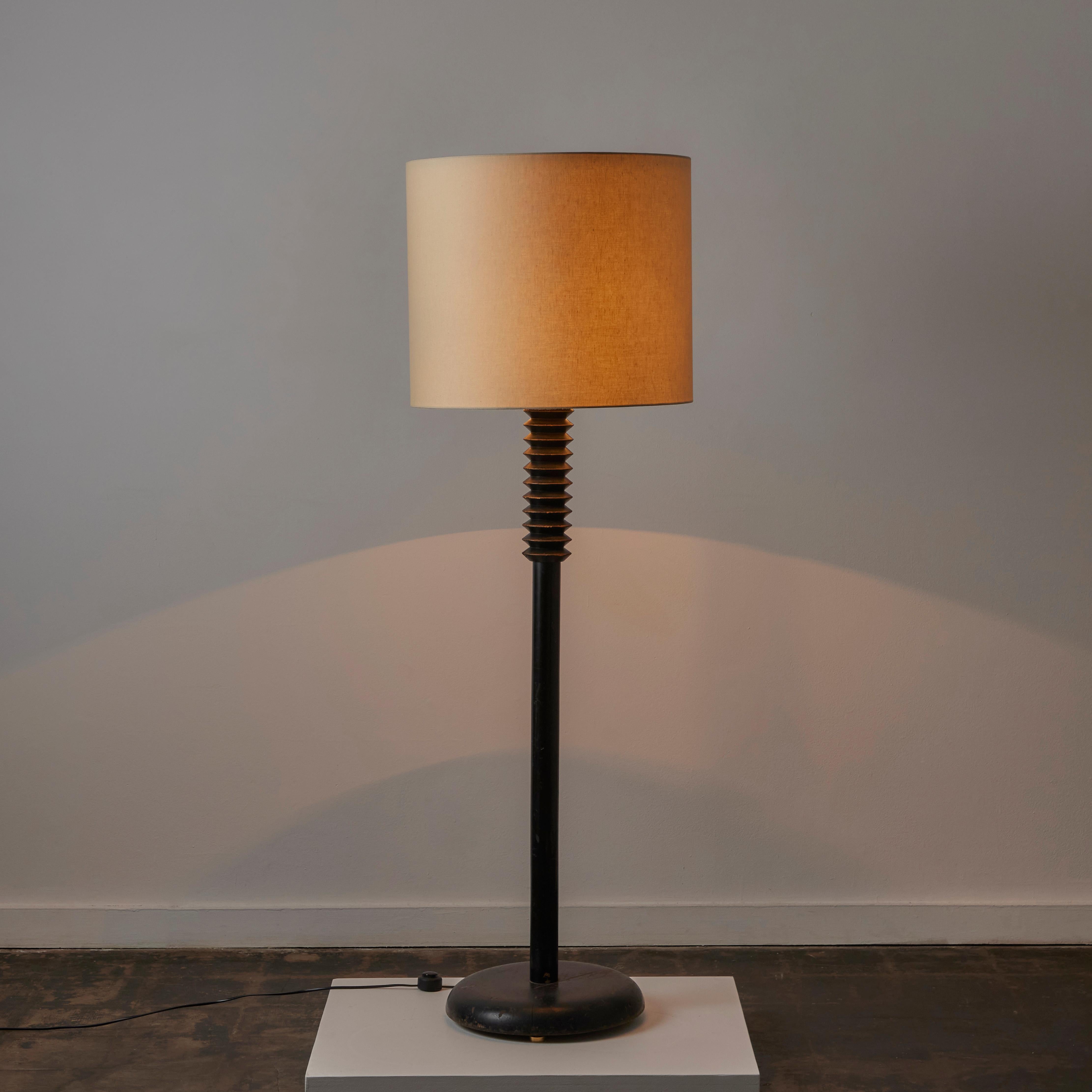 Floor Lamp by Charles Dudouyt. Designed and manufactured in France, circa the 1940s. An ebonized wooden base and stem featuring an upper-turned detail. New linen shade custom-made. The light holds a single E27 socket type, adapted for the US. A Euro