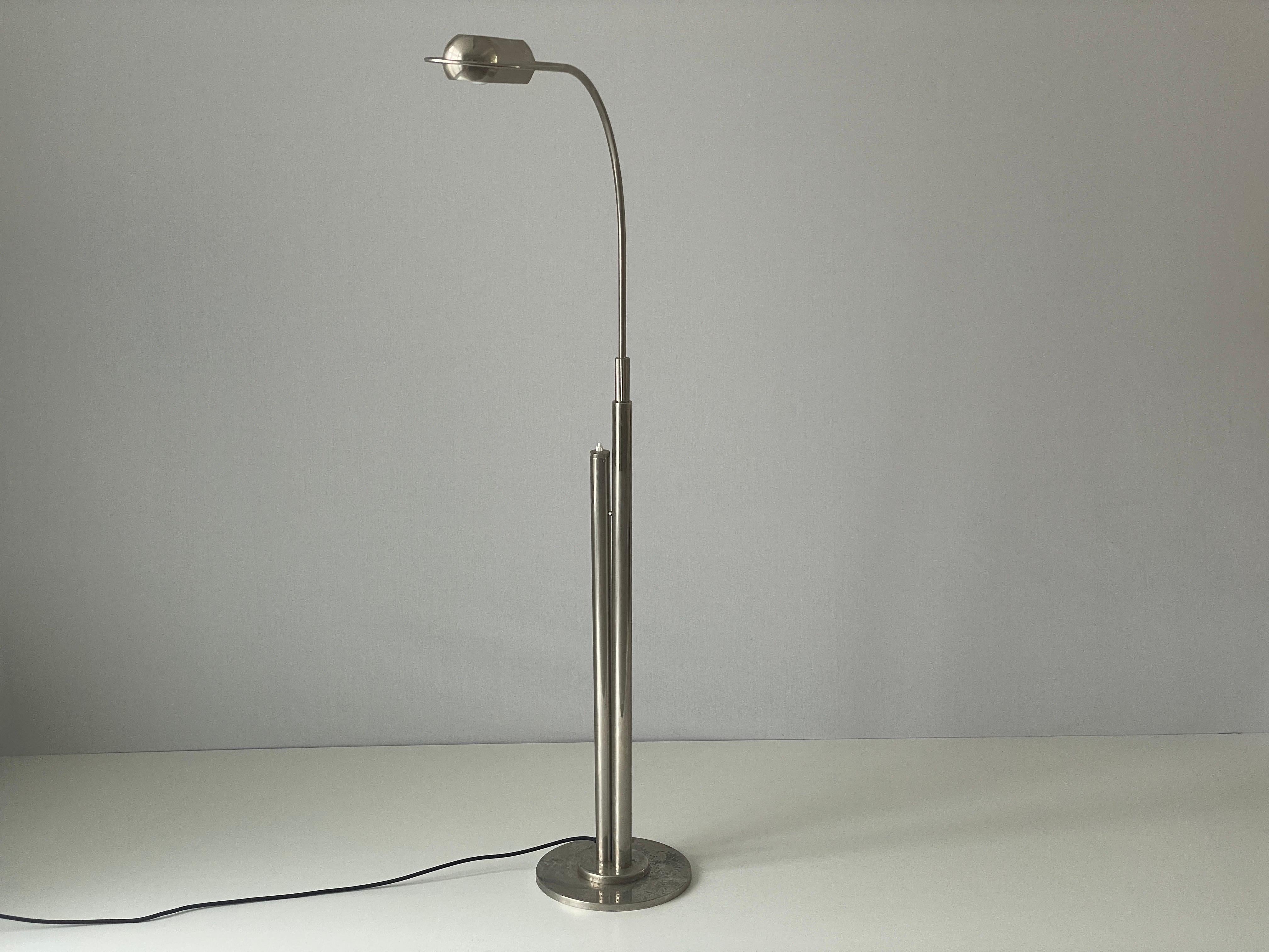 Floor Lamp by Florian Schulz, 1970s, Germany

This lamp works with E27 light bulb. Max 100W
Wired and suitable to use with 220V and 110V for all countries.

Measurements:
Height: 148 cm
Width: 84 cm
Depth: 13 cm
Shade: 26 cm x 13 cm x 6 cm
Base: 28