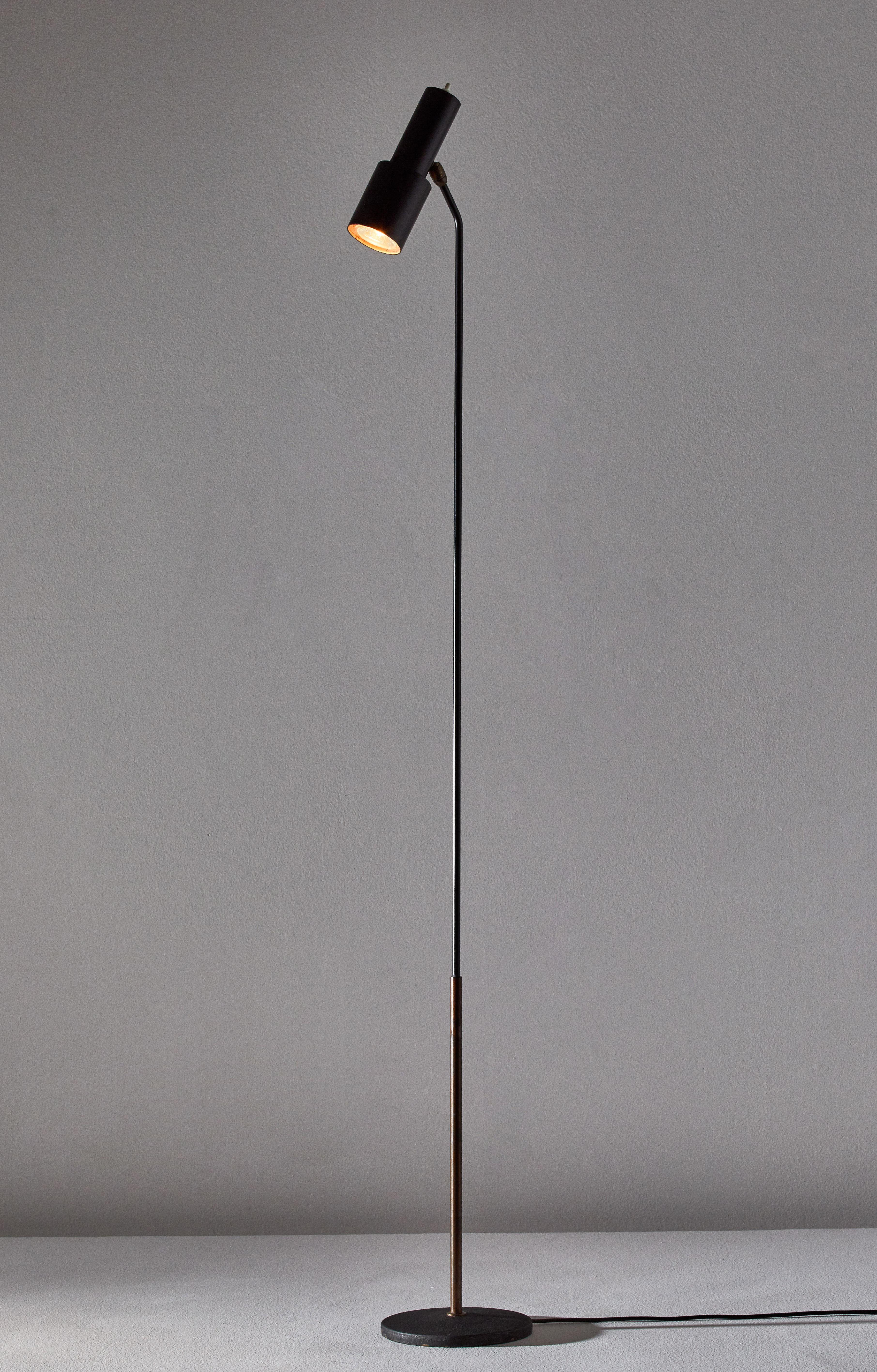 Floor lamp by Fontana Arte. Manufactured in Italy, circa 1950s. Enameled metal, brass, glass. Original cord. Shade adjust to various positions. Takes one E27 60W maximum bulb. Bulb provided as a onetime courtesy. Literature: Bibliography Quaderni di