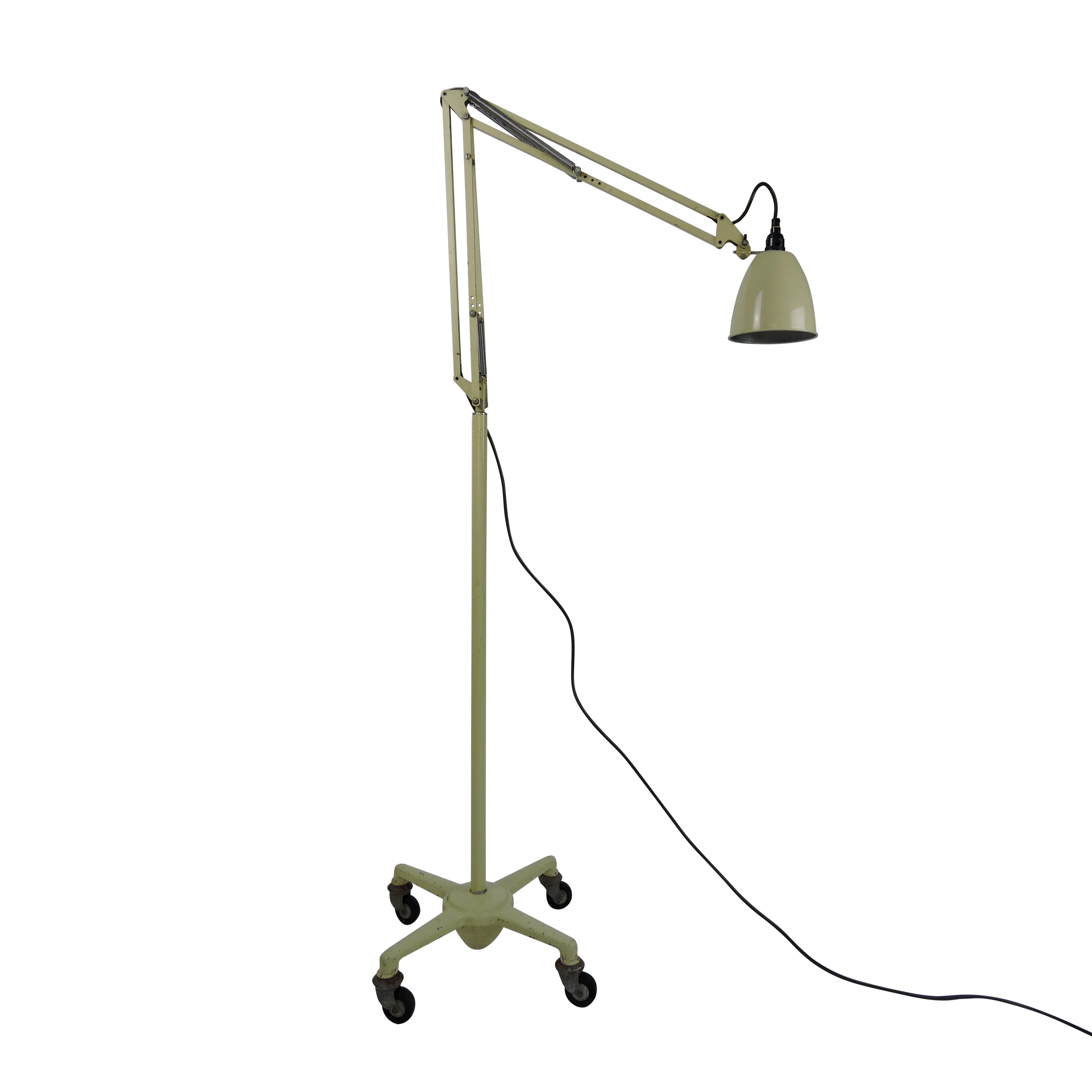 Anglepoise floor lamp on wheels, designed by George Cawardine. Manufactured by Herbert Terry & Sons, Redditch.