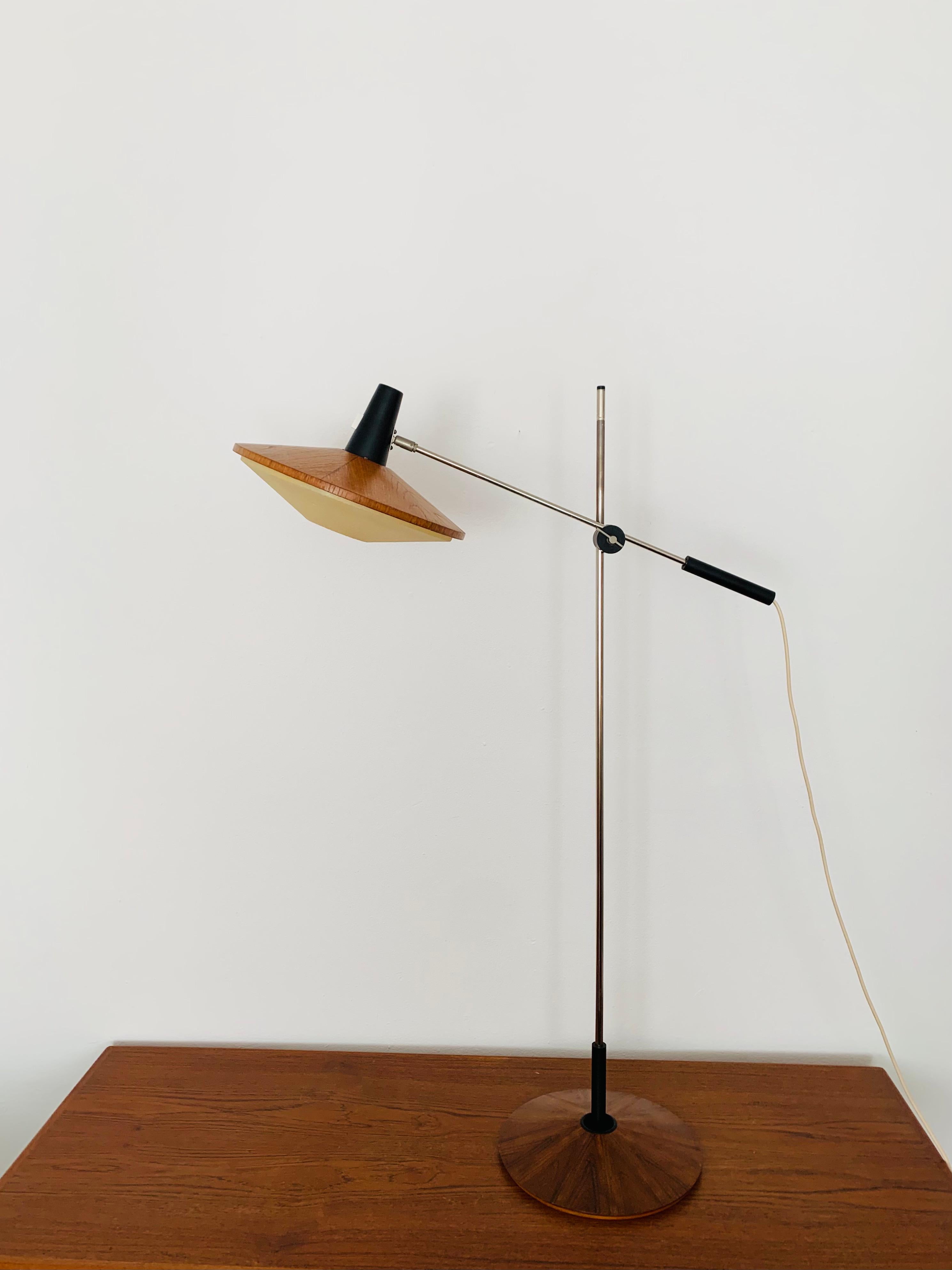 Exceptionally beautiful and very rare architect's floor lamp from the 1960s.
The design is very unusual.
The shape and the materials create a warm and very pleasant light.

Design: Georges Frydman

Condition:

Very good vintage condition with slight