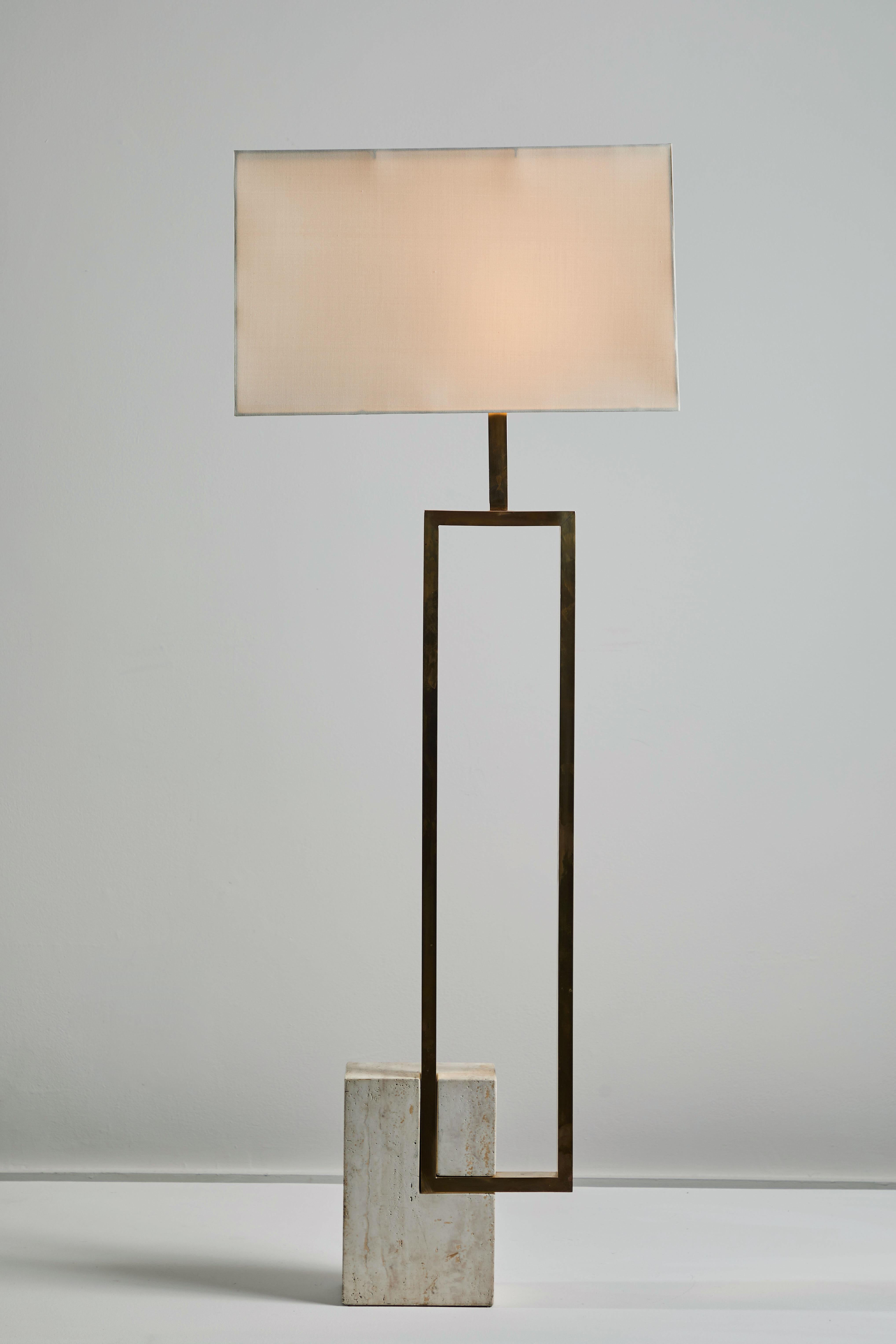 Floor lamp by Giovanni Banci for Banci Firenze. Designed and manufactured in Italy, circa 1970s. Travertine base and brass plated hardware with custom silk shade. Rewired for US sockets. On or off step switch. Takes one E27 75w maximum bulb.