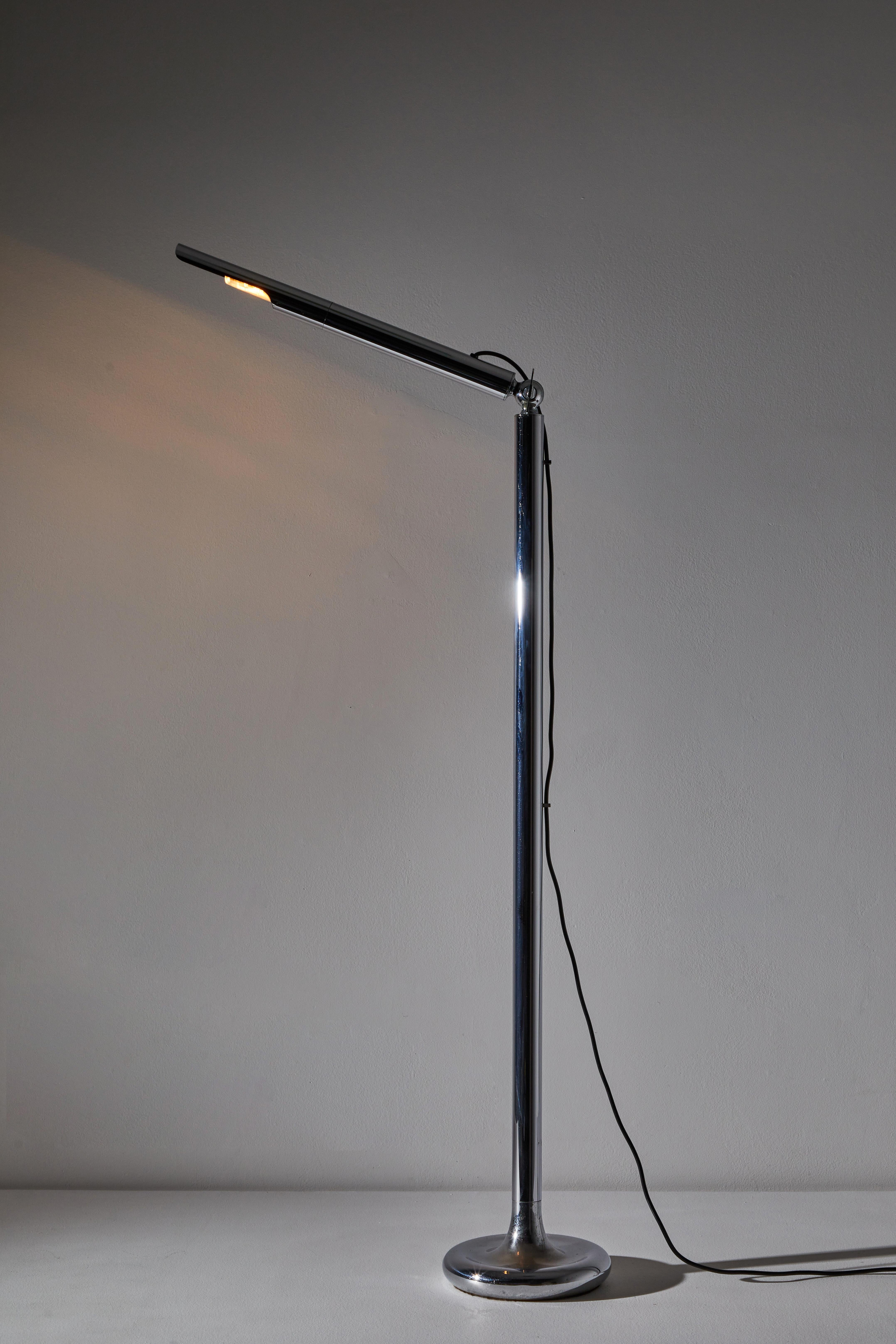 Rare floor lamp by Ingo Maurer. Designed and manufactured in Germany, circa 1960s. Chrome-plated brass. Adjustable arm by way of ball joint. Original cord. Takes one E14 60 w maximum bulb. Bulbs provided as a one time courtesy.