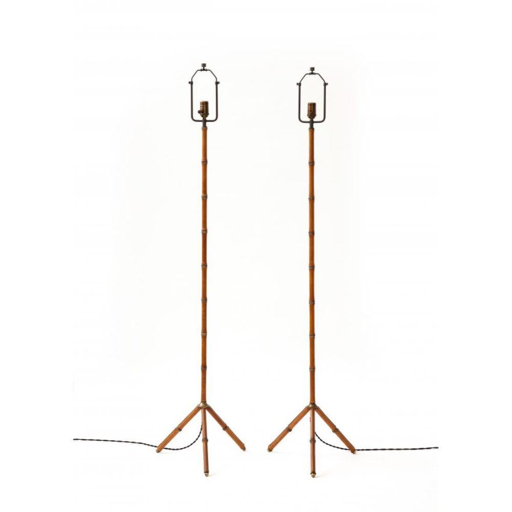 Floor Lamp by Jacques Adnet, France, c. 1950

Timeless, cool floor lamps by Jacques Adnet, in a beautifully patinated cognac leather. The brass details interrupt the leather in intervals, creating a faux-bamboo effect.
