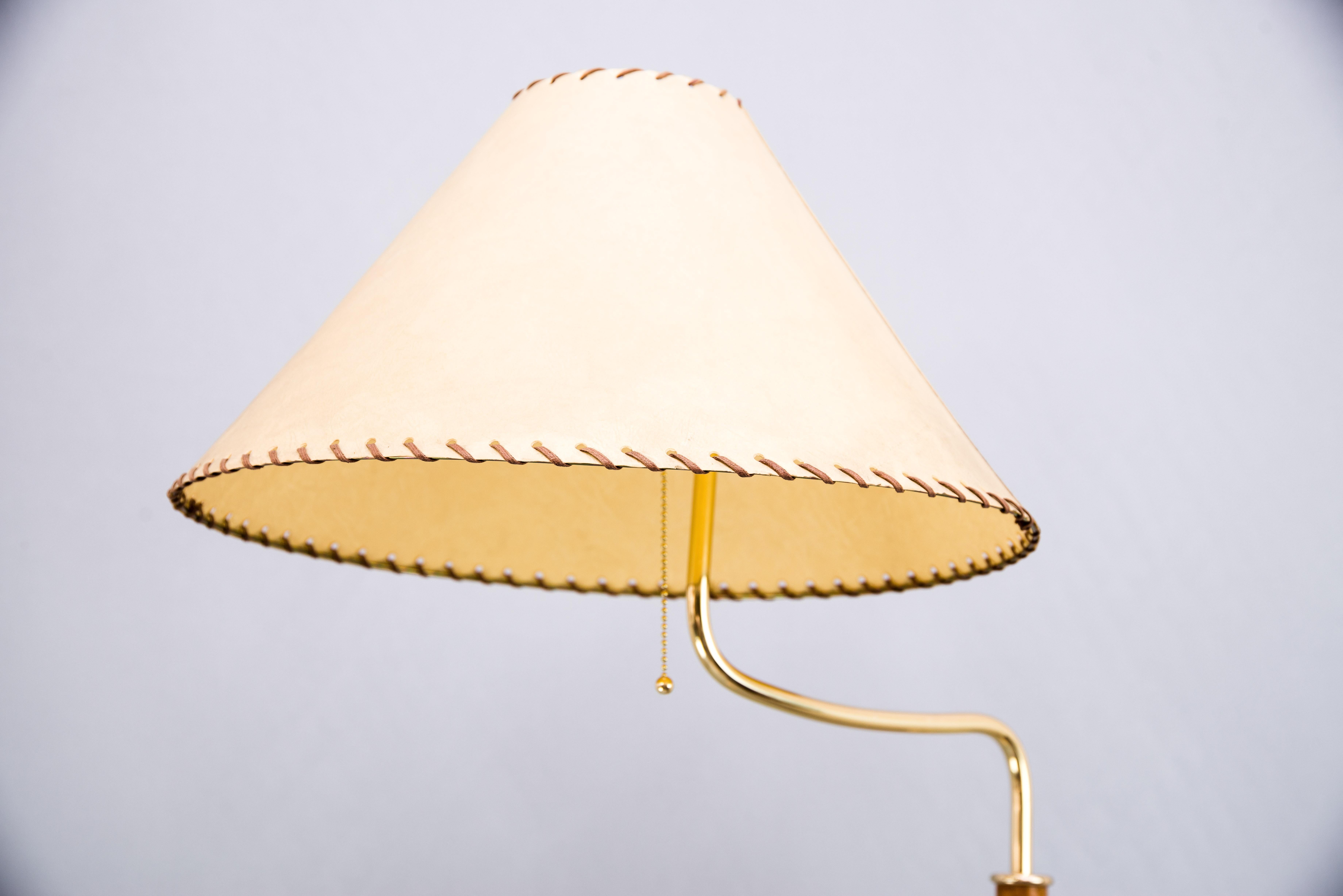 Floor lamp by Josef Frank and executed by J. T. Kalmar Vienna around 1950s.
Bamboo stem.
Partly movable from left to the right.
Original fabric shade.
