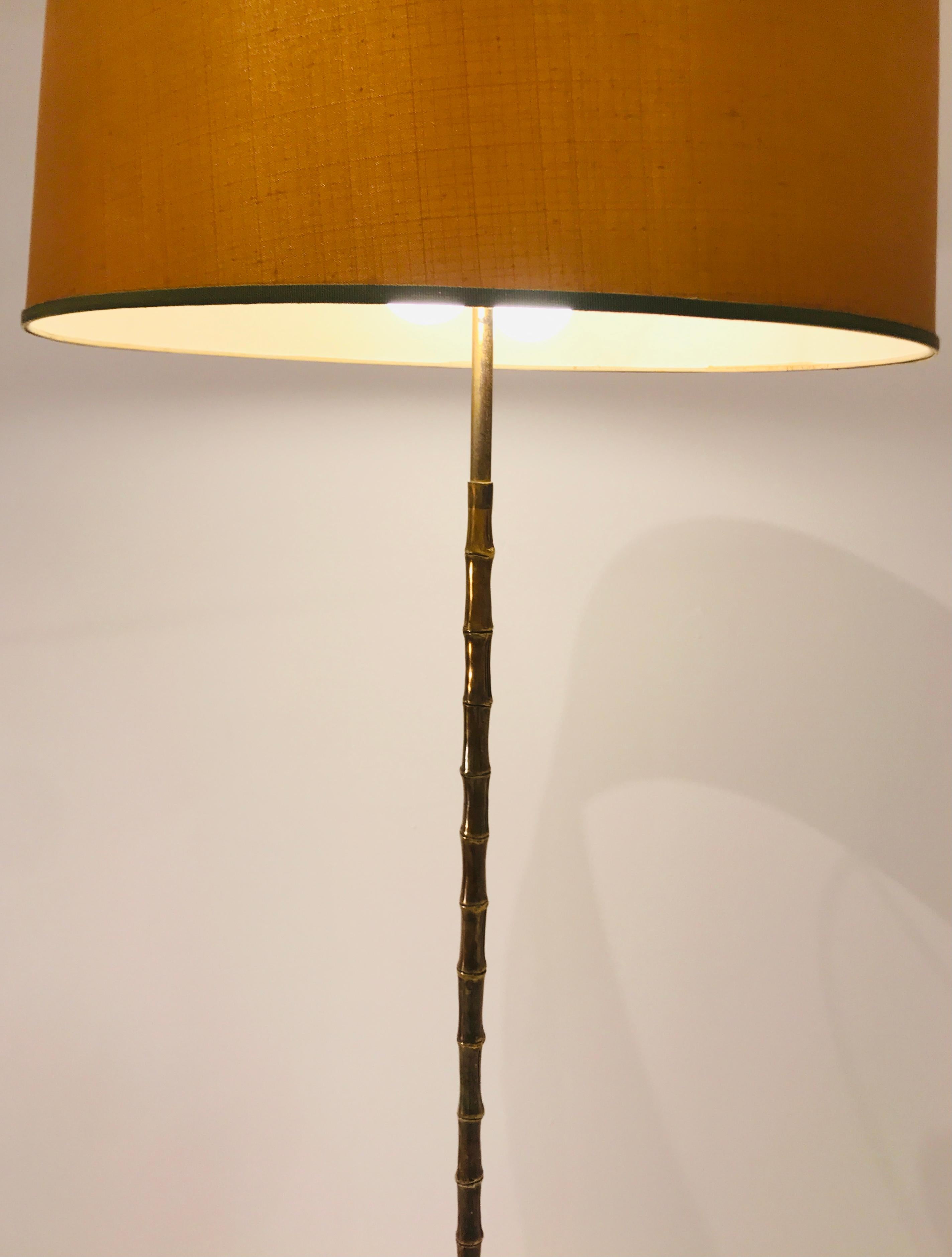 Floor lamp by Maison Baguès, faux bambou, bronze, circa 1950.
New rewired.
Dimensions : 50cm x 168cm H
Without shade 37cm x 168cm H.