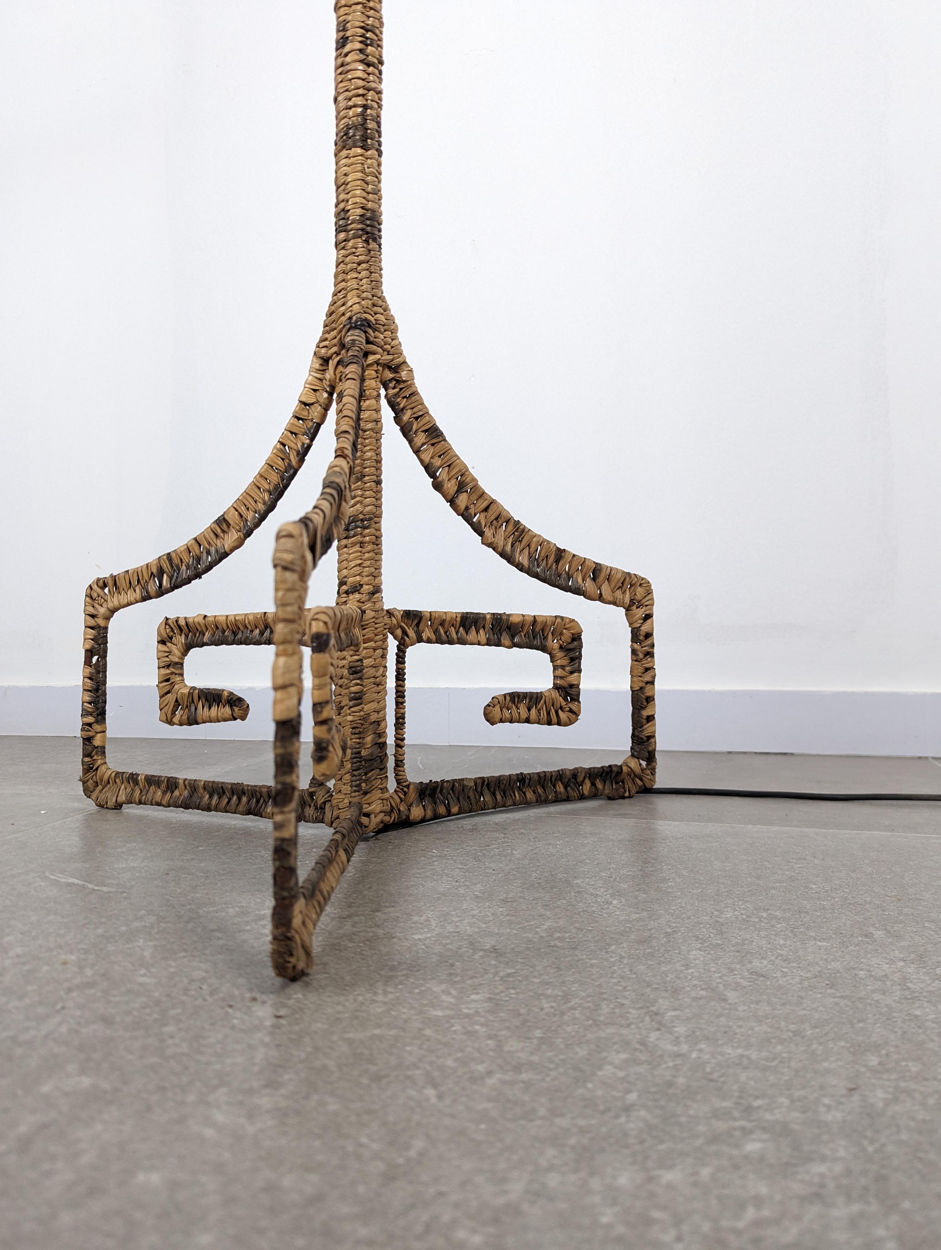 Floor lamp by Mexican artist and sculptor Mario López Torres made of iron woven with chuspata, its base with an elegant Greek key shape at the base creates an exclusive original mid-century floor lamp.