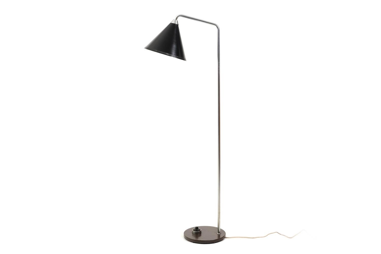 Floor lamp by Peter Hvidt for LYFA Denmark 1950s. With black conical metal shade. Dark brown lacquered base and steel lamp shaft. We have the same lamp with red shade here at 1stDibs