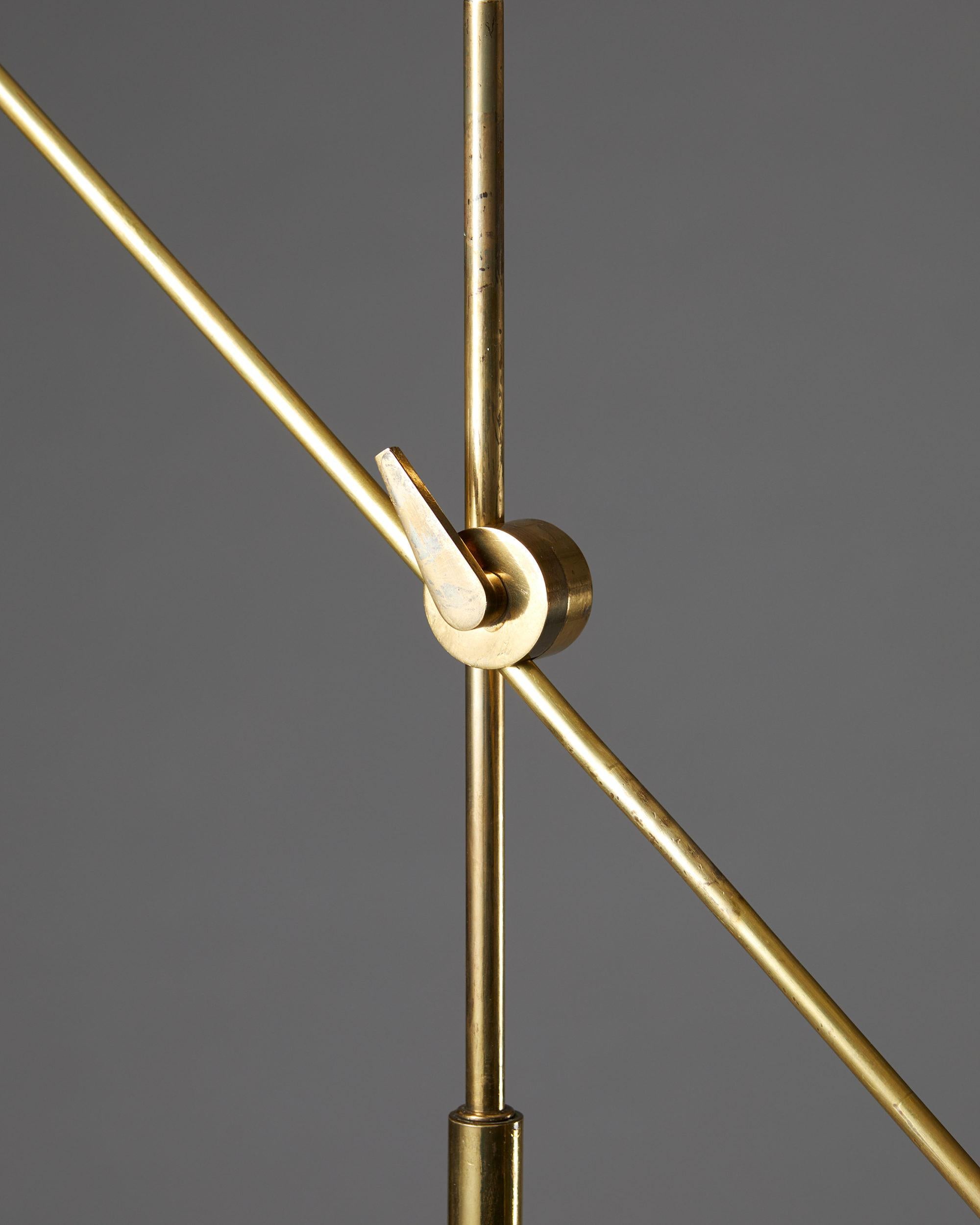 Floor lamp model 376 designed by TH. Valentiner for Poul Dinesen,
Denmark. 1960s.

Nickle plated brass.

Dimensions: 
H: 145 cm / 57