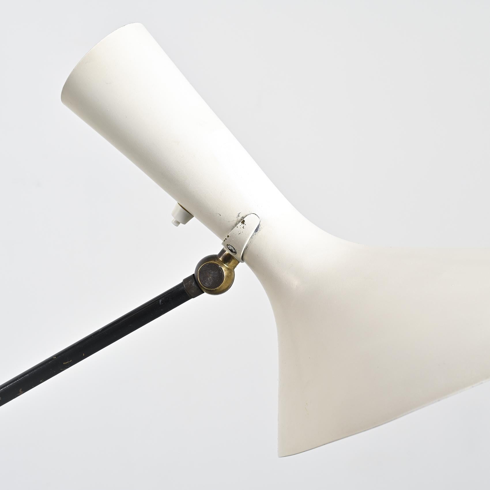 
Floor lamp designed by Professor Carl Moor and produced by BAG Turgi in the end of 1940s.

A key figure in Swiss design, Carl Moor presents here a rare piece that embodies the elegance and precision of Swiss modernism.

This floor lamp stands on a