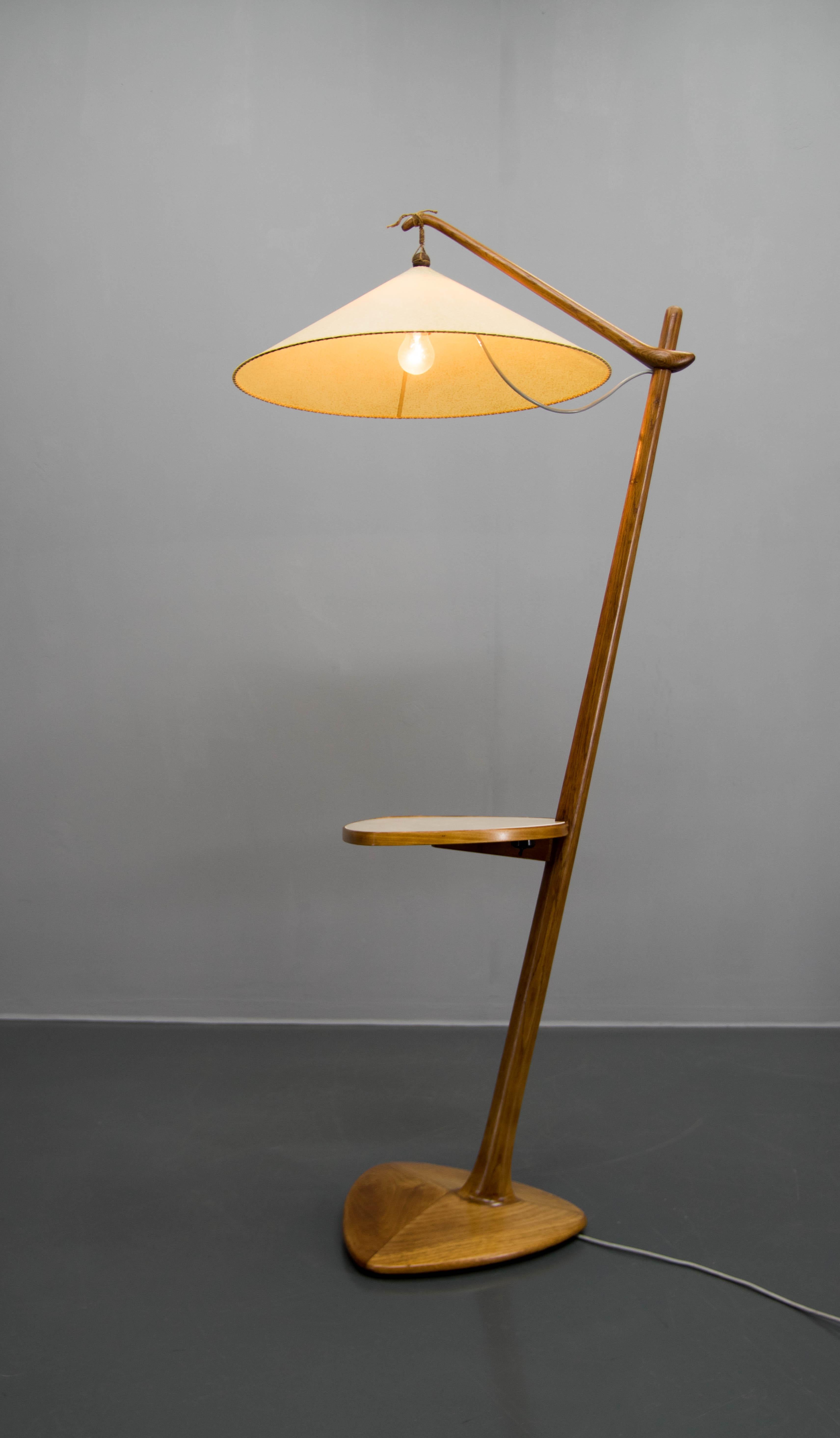 Iconic floor lamp designed by Vaclav Rada for Krasna Jizba in 1930s.
Wooden parts have been refinished, new shade made of parchment paper.
New glass table in black or creamy white according to the client's decision.
Rewired: 1x40W, E25-E27 bulb
US