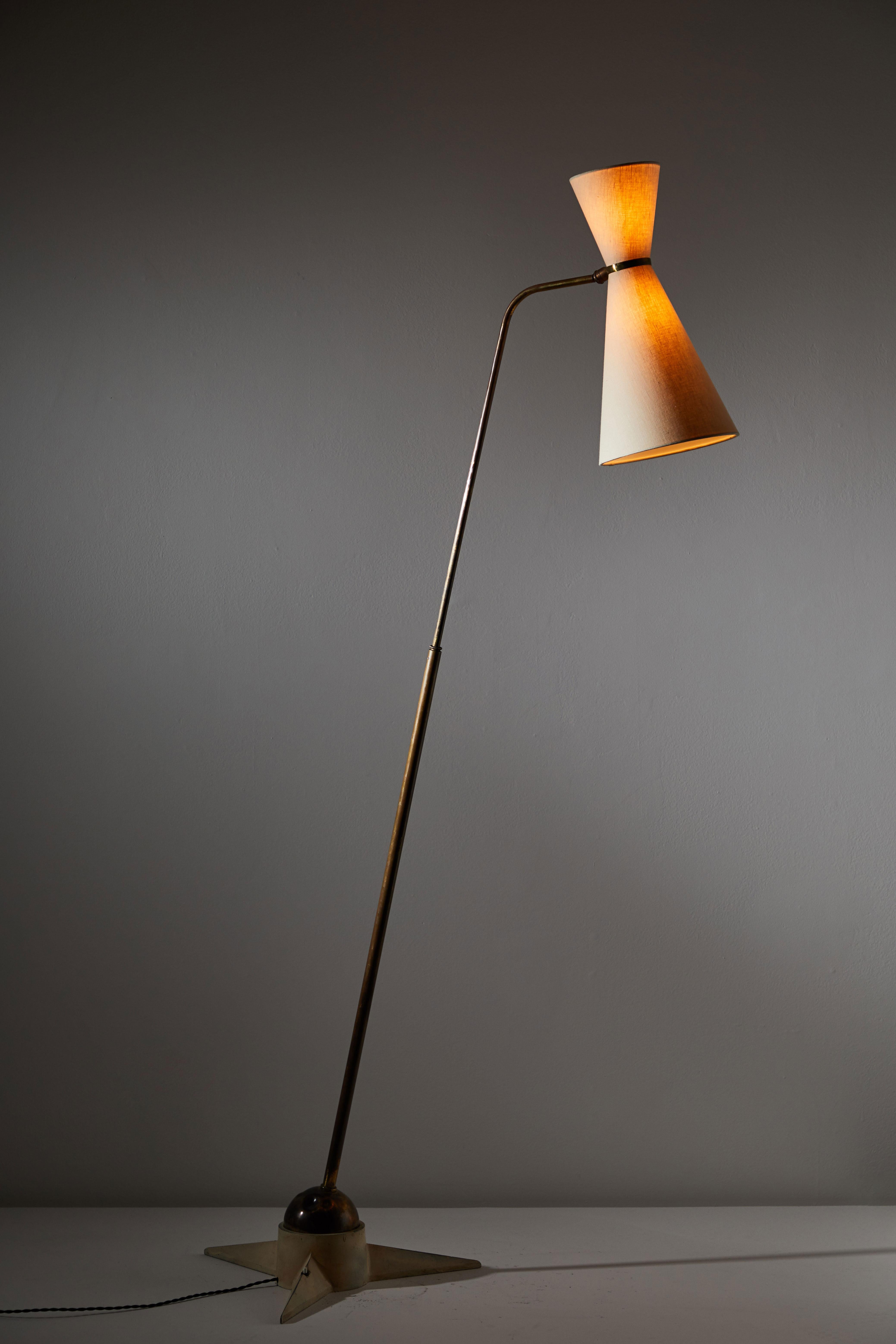 Floor lamp designed by Robert Mathieu in France, 1955. Enameled metal and brass. Adjustable custom linen shade. Adjustable height by way of pivoting brass ball. Rewired with black french twist cord. Takes one E27 75 w maximum bulb.