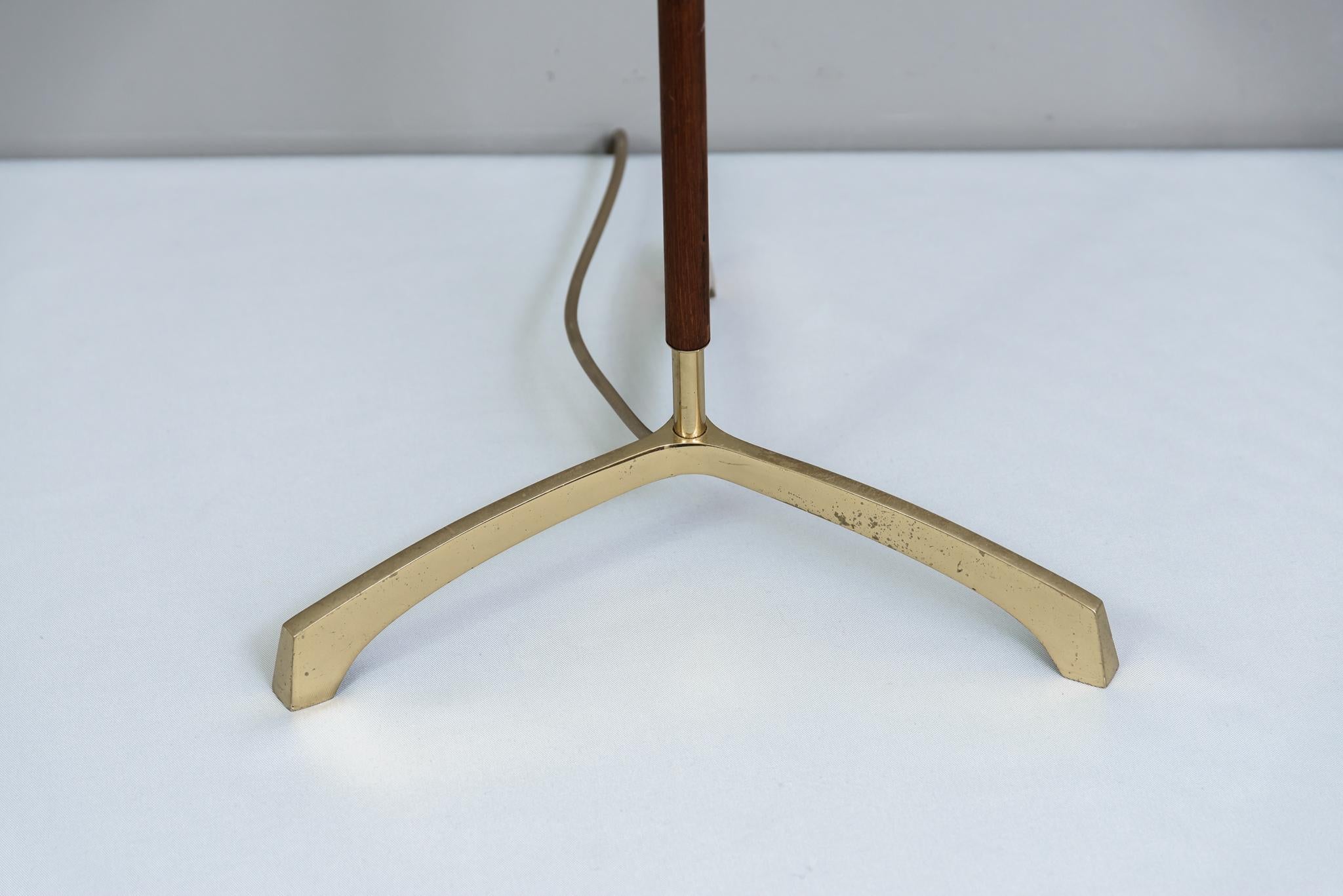 Floor lamp by Rupert Nikoll circa 1950s
Wood and brass stem
Original condition
Only the shade is new.