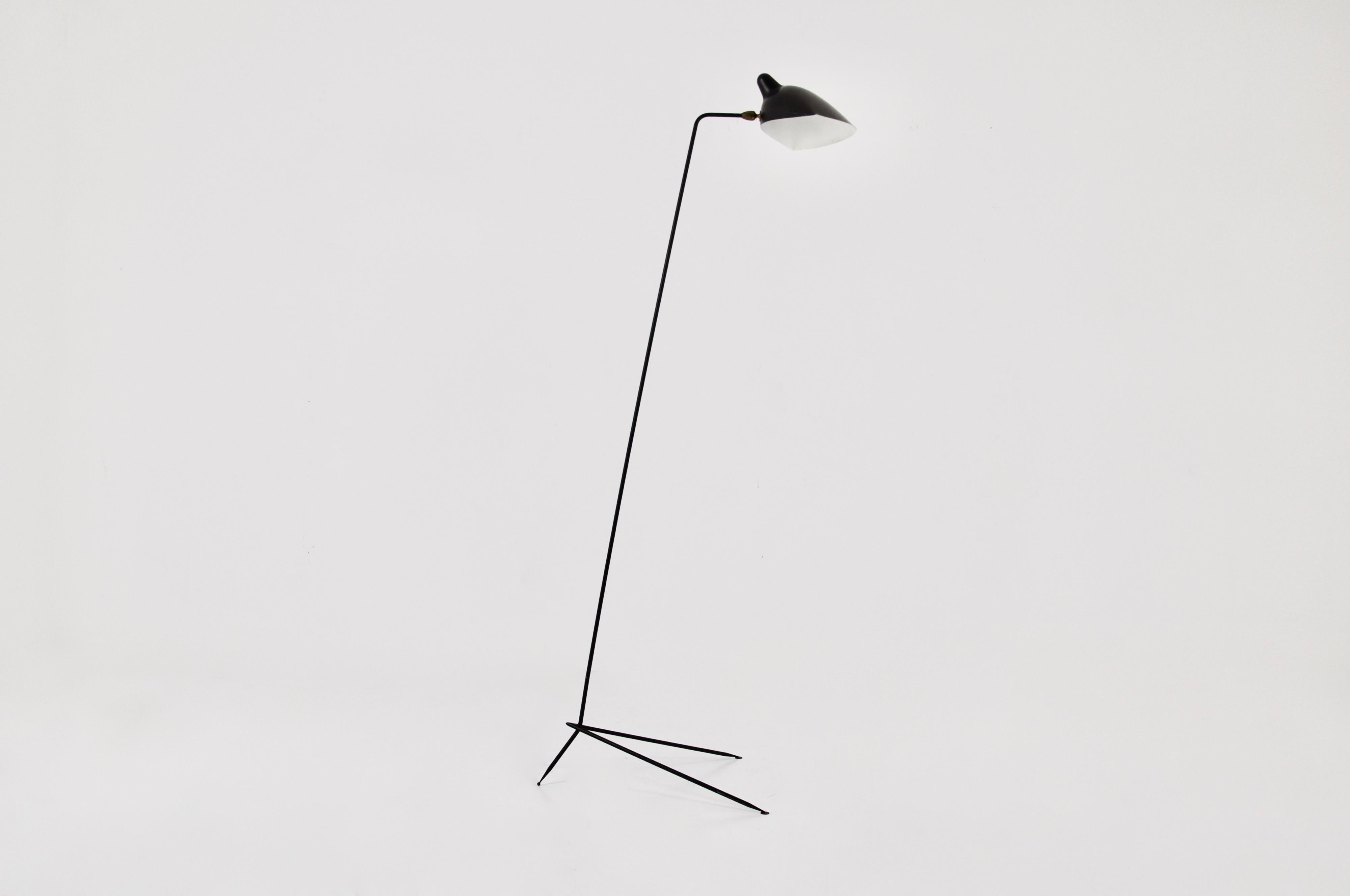 Floor lamp in black metal by Serge Mouille. This is the first edition made in 1953. Wear due to time and age.  