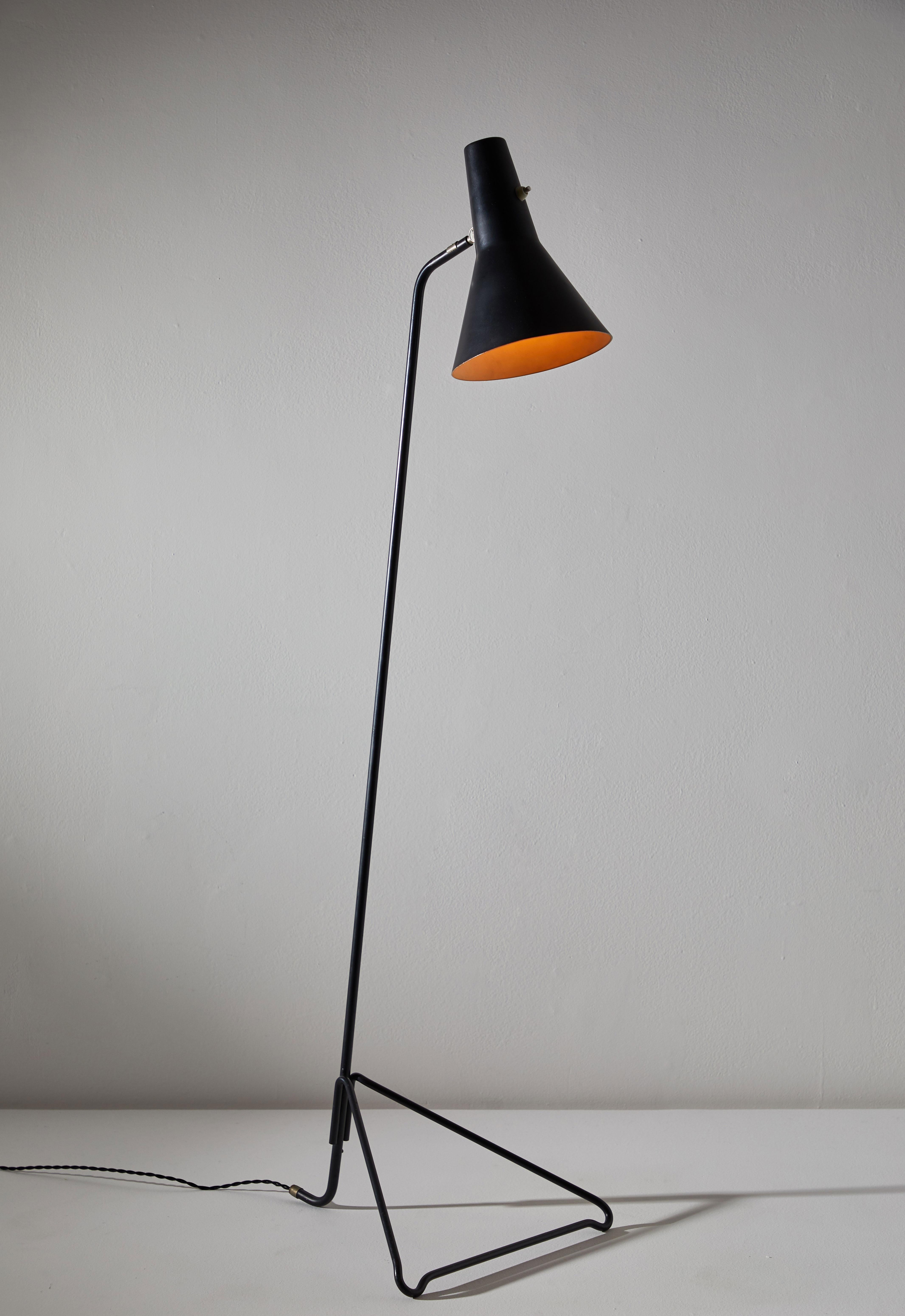 Floor lamp by Svend Aage Holm Sorensen for Asea. Designed and manufactured by Asea in Sweden, circa 1950s. Enameled metal, brass accents. Rewired for US sockets with black French twist cord. Takes one E27 100w maximum bulb.