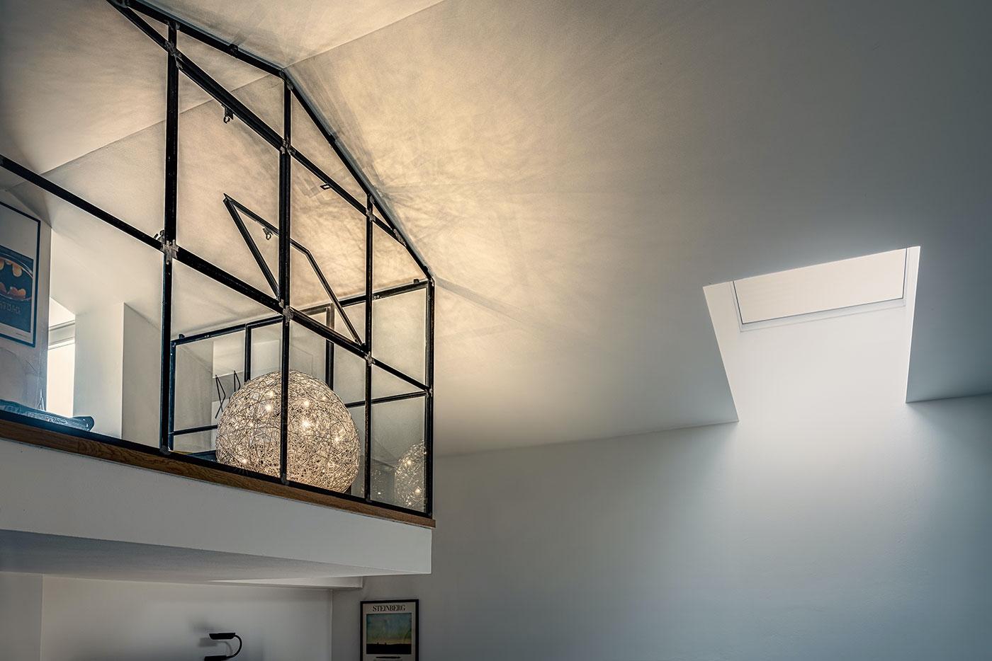 The Fil de Fer, designed by Enzo Catellani, is a signature floor lamp made from shaped, woven aluminium wire illuminated from within. Its compact sphere emits a soft, intimate glow, making it ideal for creating cozy and atmospheric corners in any