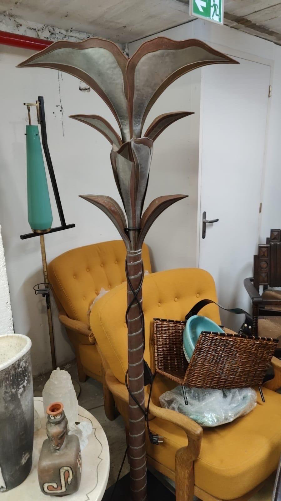 This floor lamp was done by the artist Henri Fernandez and manufactured by Maison Honore in the seventies