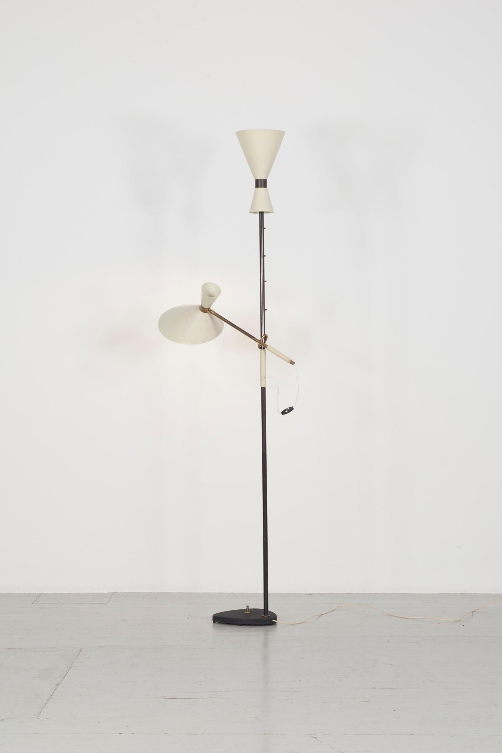 Floor Lamp - Design by J.T. Kalmar, manufactured by Kalmar, Vienna, 1950s. This lamp has an adjustable, lacquered metal shade and uplight. 