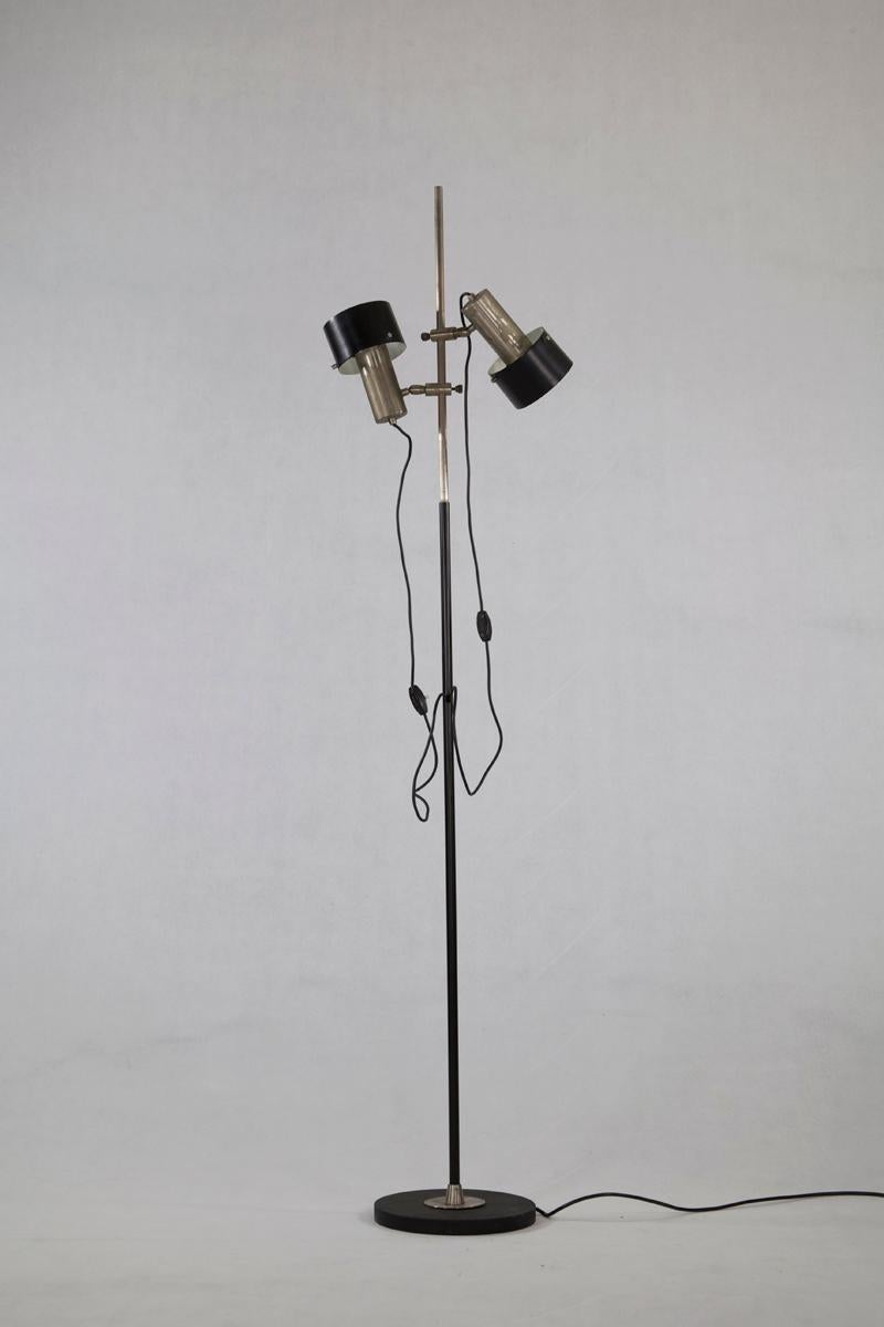 Floor lamp, designed by Stilnovo, Italy, 1960s. The lamp is nickel-plated and has black lacquered Aluminium shades which are adjustable.

Feel free to contact us for more detailed pictures.
  
