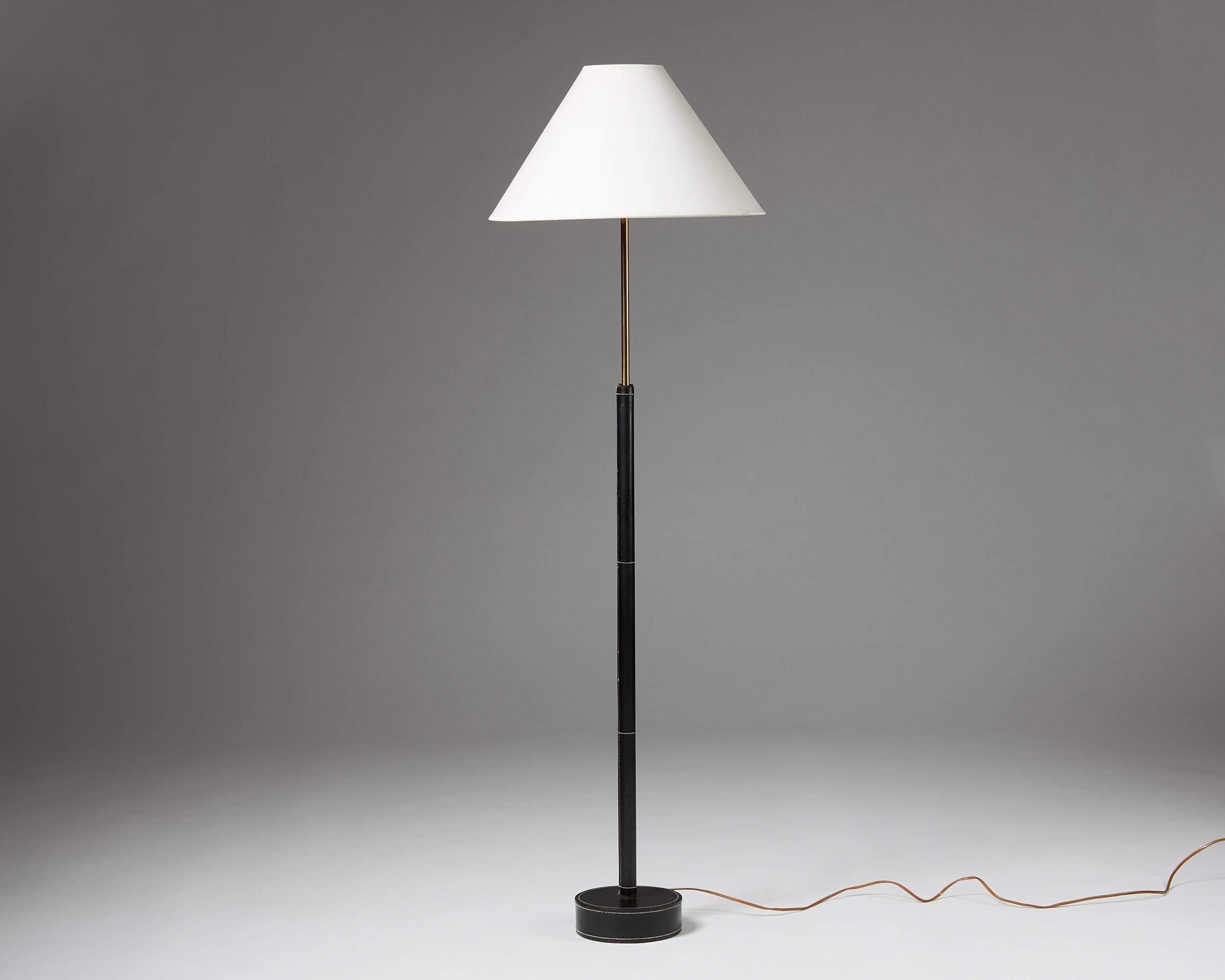 Sweden, 1960’s

Leather stand, canvas lamp shade.

Marked “Bergbom G 08”

Measurements: 
W: 45 cm / 17 ¾’’
L: 146 cm / 4' 9