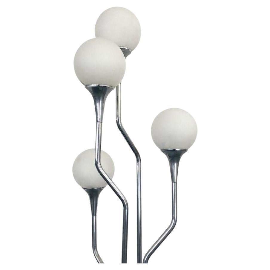 Space age floor lamp designed by Goffredo Reggiani produced for Studio Reggiani.
Made in Italy from the 1960s.
Features four cascading chrome stems on a painted metal base with four milk glass globe shades.
overall in great vintage condition!
One of