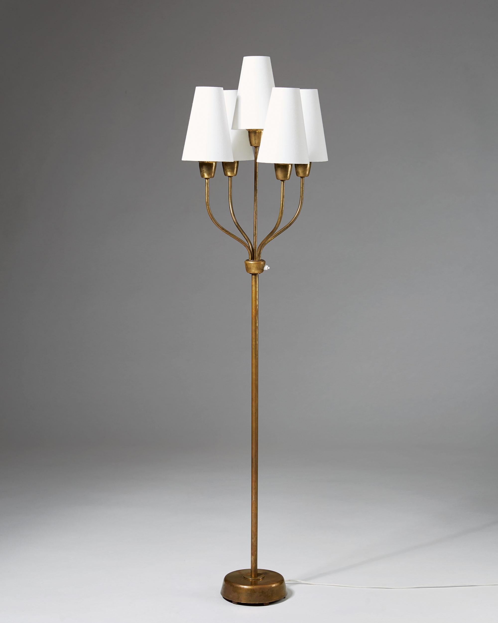 Brass and textile shades.

Measures: H 162 cm/ 5' 4