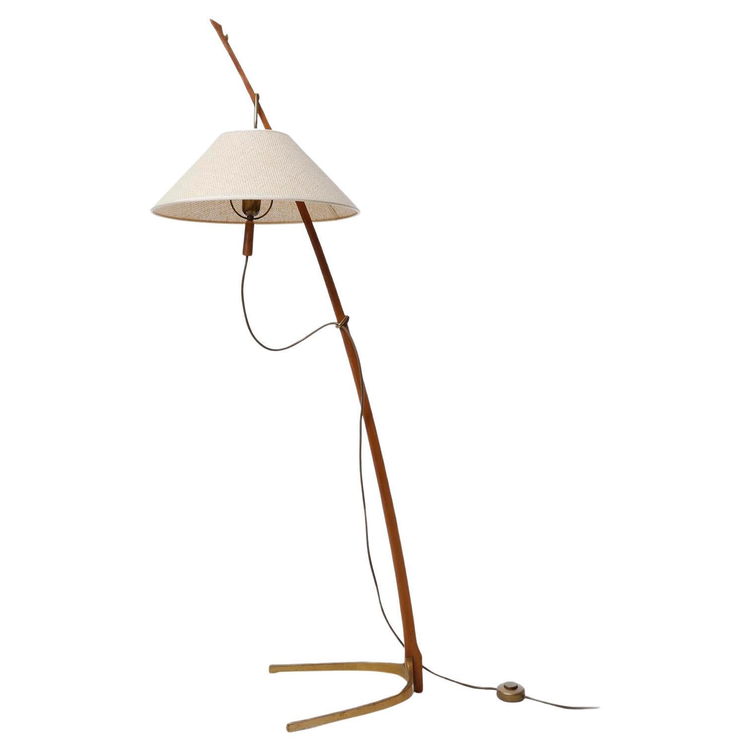 A gorgeous floor lamp by J.T. Kalmar, Vienna, Austria, manufactured in midcentury, circa 1960 (1950s or 1960s).
The light is documented in the Kalmar catalogues from 1952 as well as from 1960.
'Dornstab' is the German word for 'thorn stick'. Four
