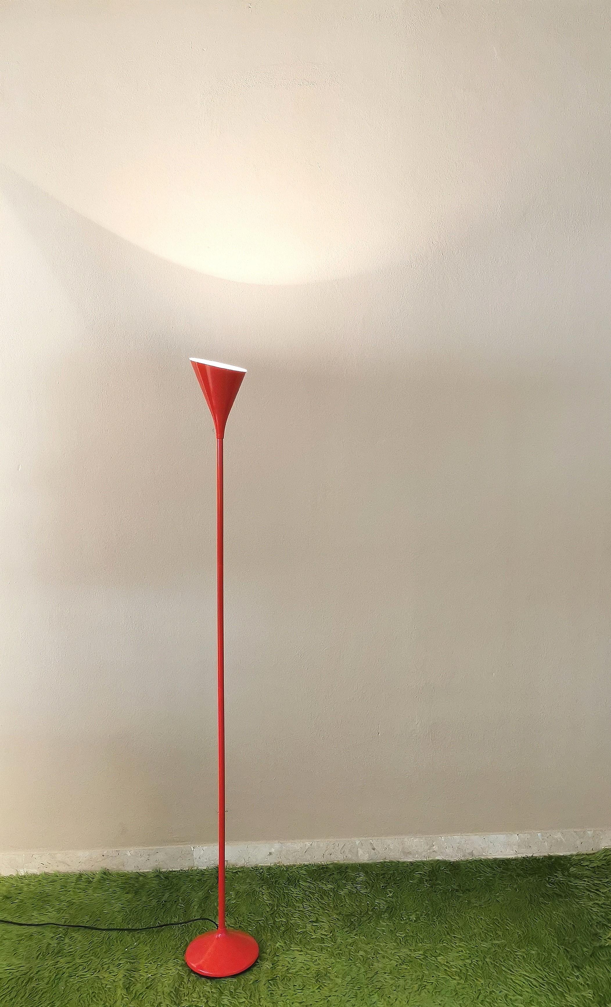 Floor lamp in red enamelled metal with oblique cut conical diffuser. Italian production of the 90s.