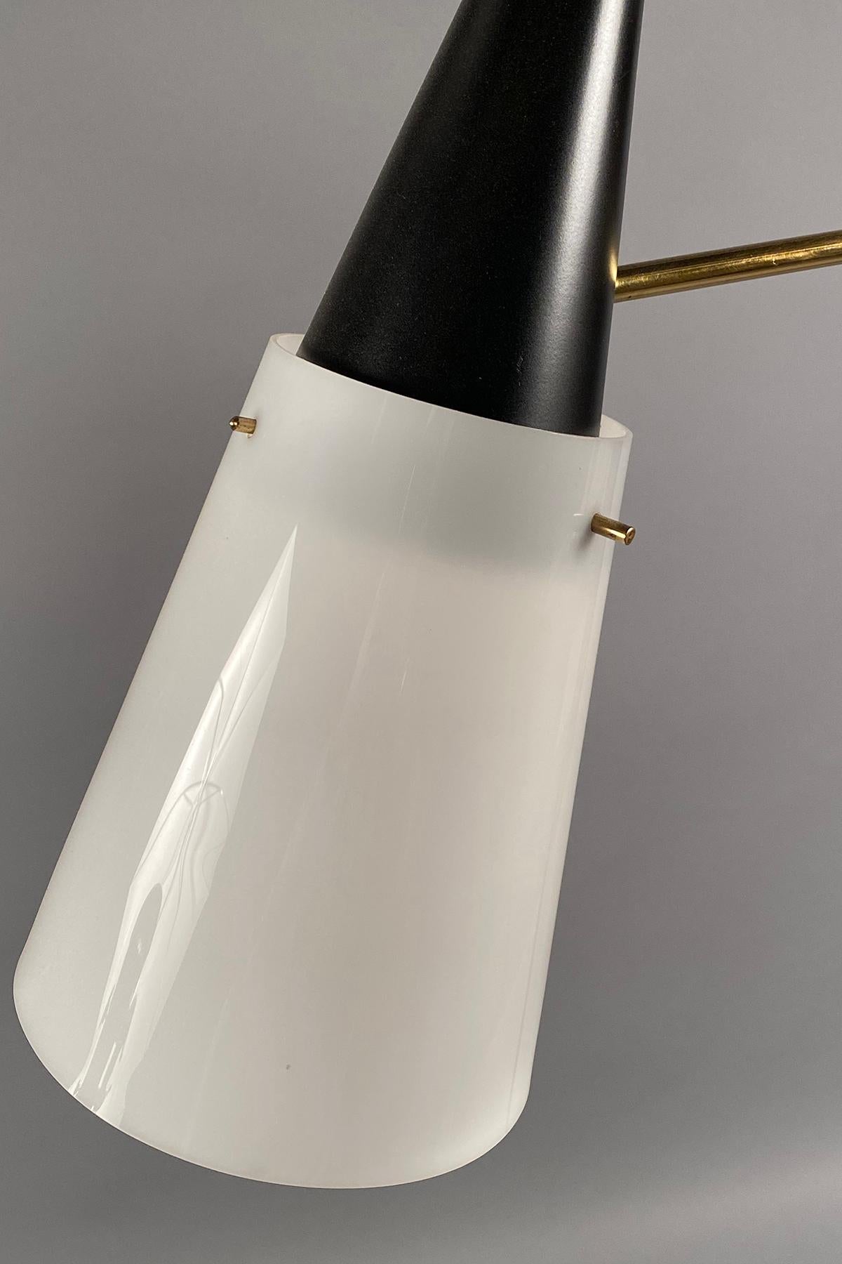 Black patinated and polished brass floor lamp with a down-facing acrylic shade. Brass switch on the original marble base.
  