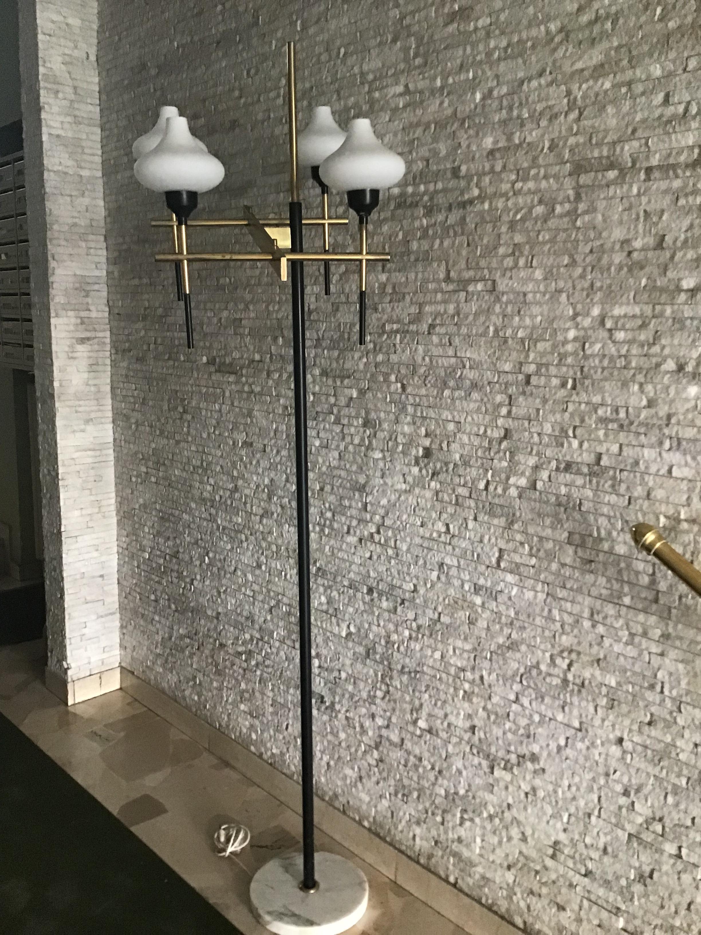 Exceptional floor lamp four-light marble iron brass opaline glass, Italy, in the style of Stilnovo, circa 1958.
