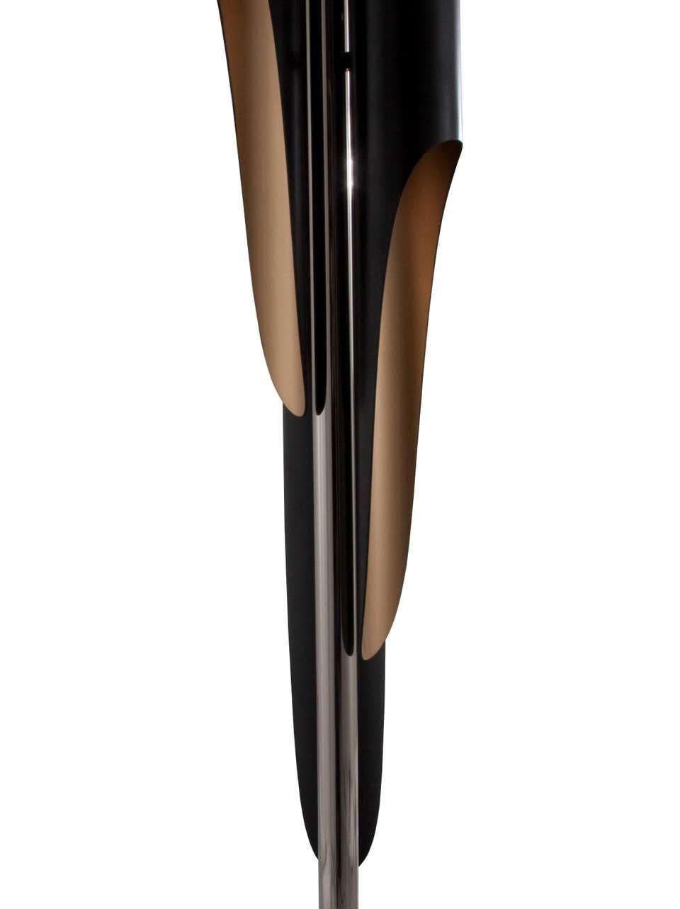 Floor lamp in black and steel.

6 x G09 bulbs (included) (for USA not included) max 40W per bulb

Dimensions:
Height 68.9 in. (175 cm)
Diameter 11.82 in. (30 cm)

Handmade in brass and aluminum, the minimal black floor lamp has a matte black