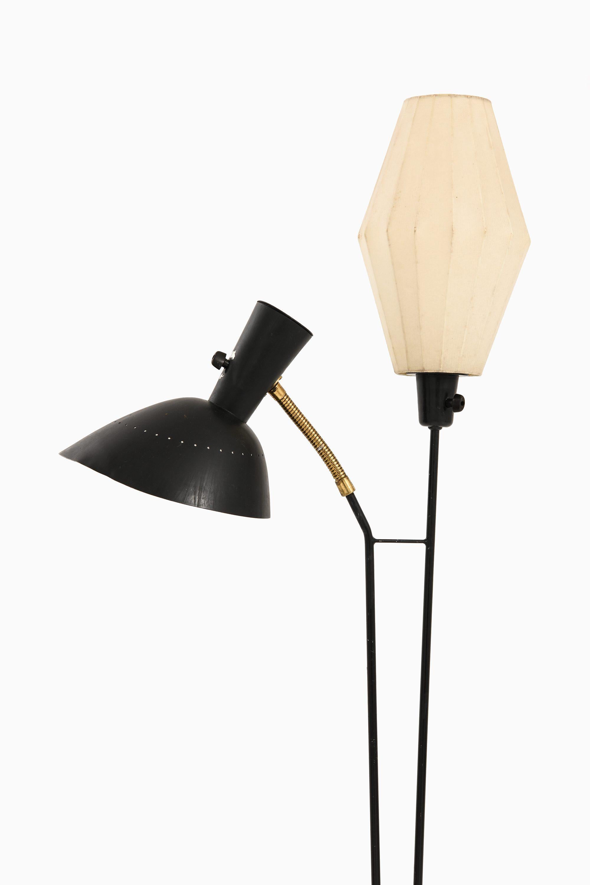 Floor Lamp in Black Lacquered Metal by Hans Bergström, 1950's

Additional Information:
Material: Black lacquered metal
Style: Mid century, Scandinavian
Produced by Ateljé Lyktan in Åhus, Sweden
Dimensions (W x D x H): 55 x 22 x 152 cm
Condition: