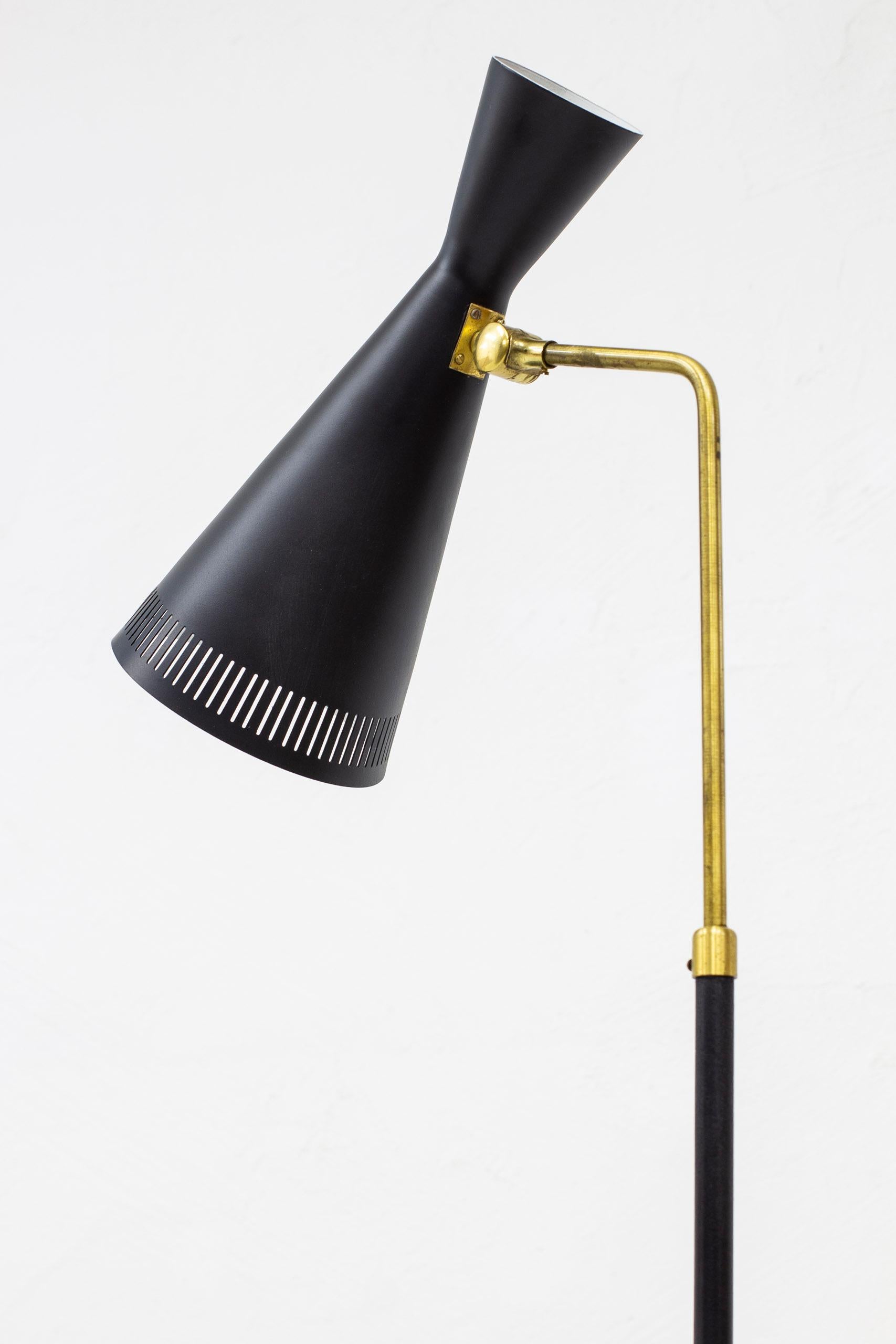 Scandinavian Modern Floor Lamp in Brass and Black by Pagos, Sweden, 1950s