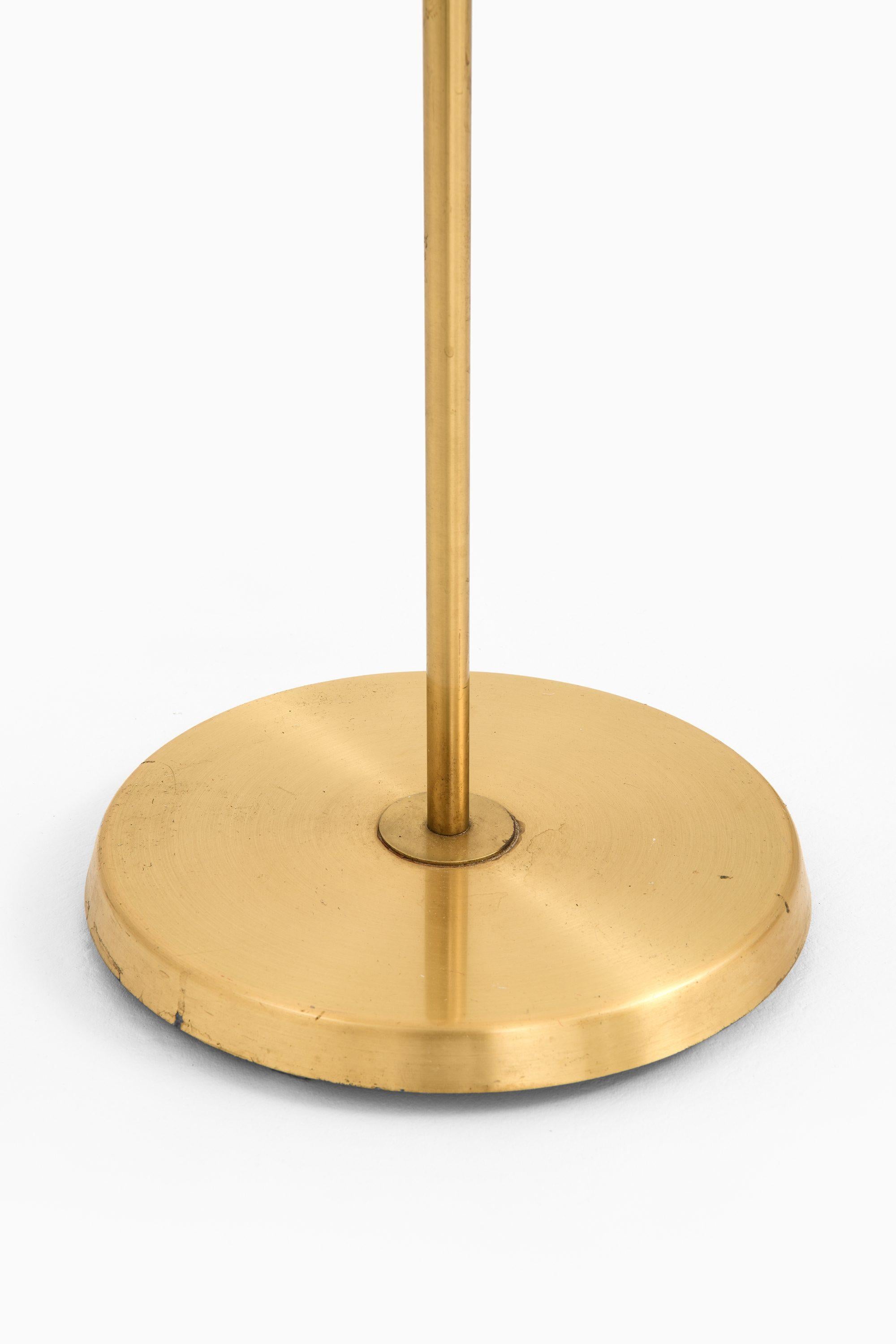 Swedish Floor Lamp in Brass and Fabric Attributed to Hans Bergström, 1950's For Sale