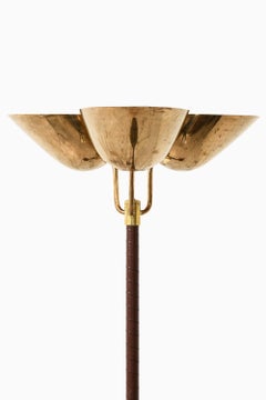 Lámpara de pie de latón y cuero de Carl-Axel Acking, años 40