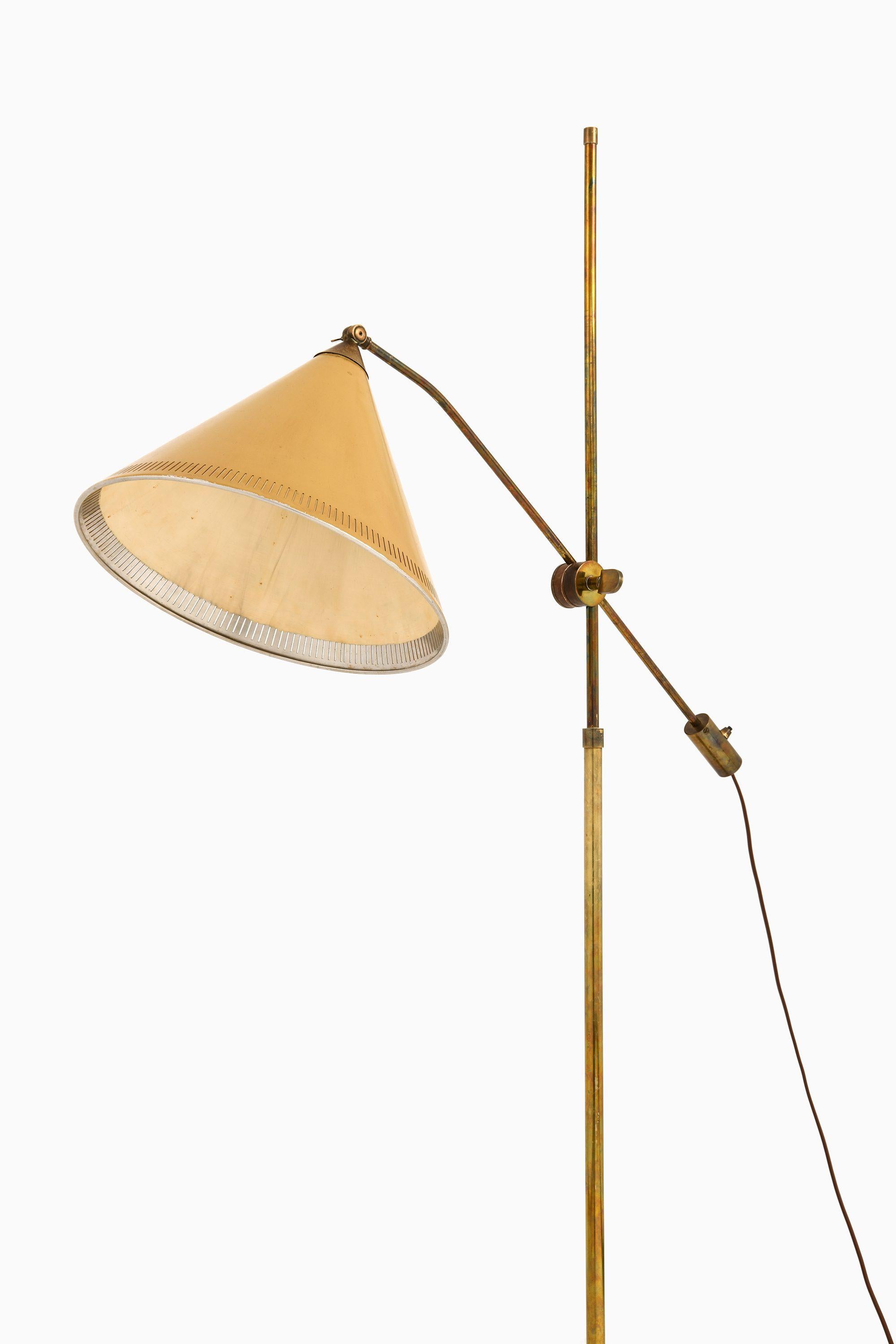 Danish Floor Lamp in Brass and Original Yellow Lamp Shade, 1950's For Sale