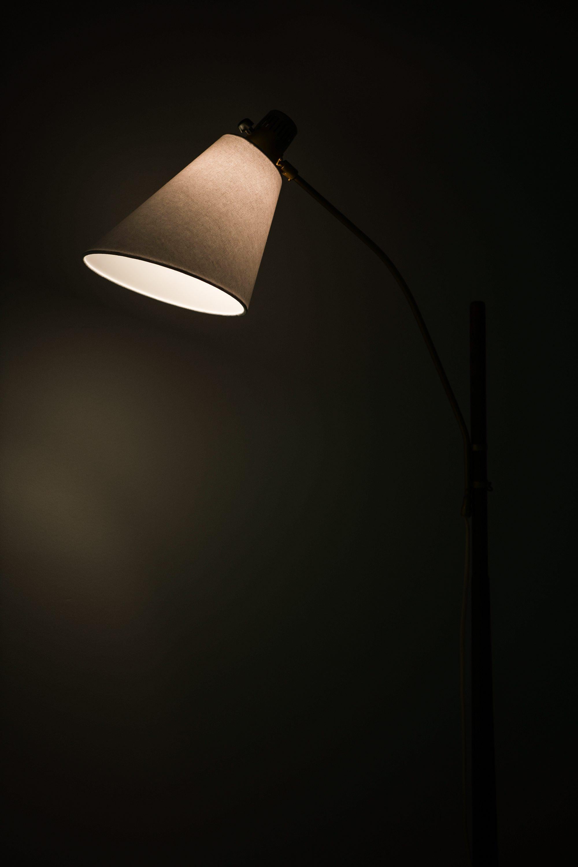 Swedish Floor Lamp in Brass and Teak by Hans Bergström, 1950's For Sale