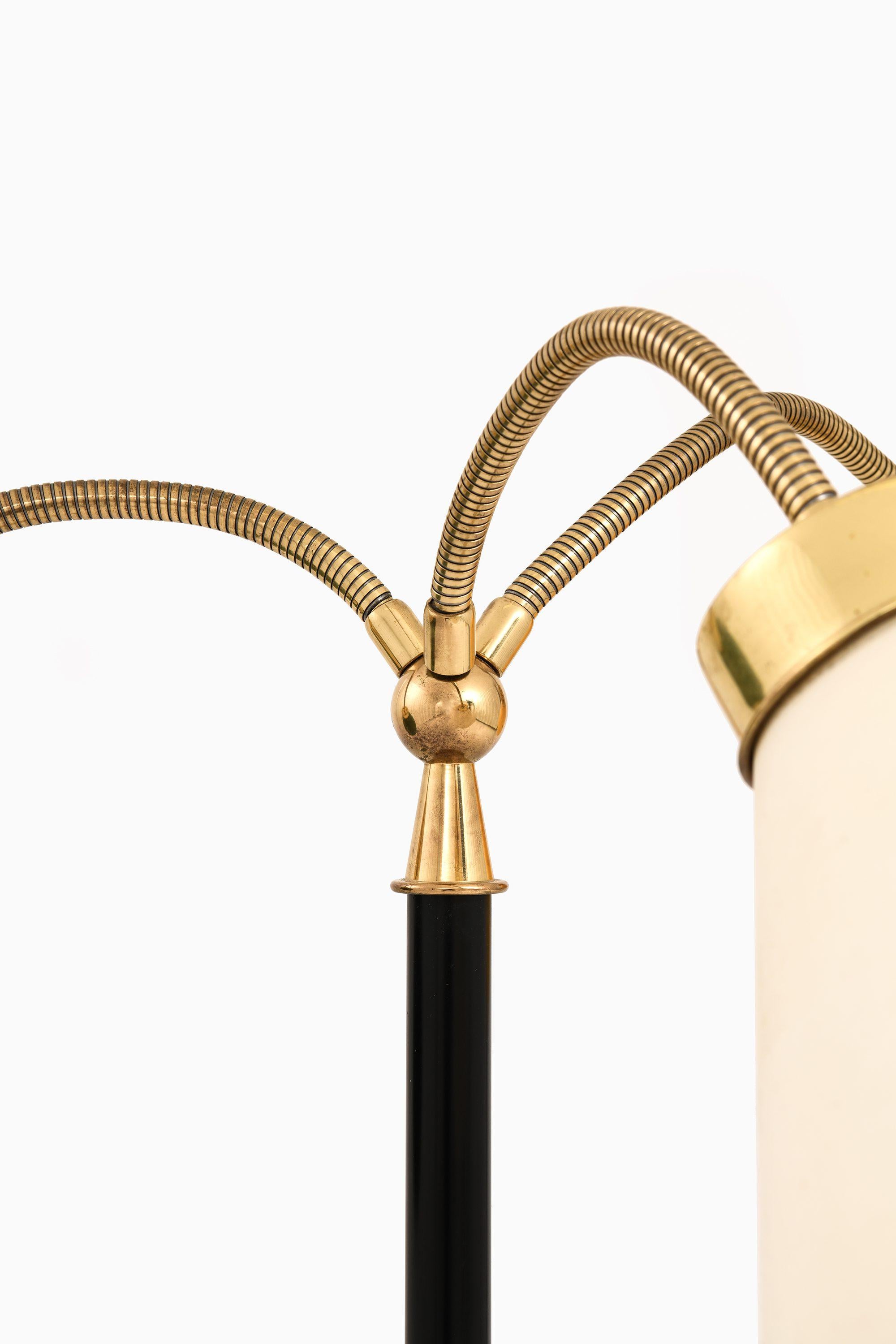 Floor Lamp in Brass, Black Lacquered Metal and Original Shades by Josef Frank, 1938

Additional Information:
Material: Brass, black lacquered metal and original shades
Style: Mid century, Scandinavian
Designed in 1938
Rare floor lamp model