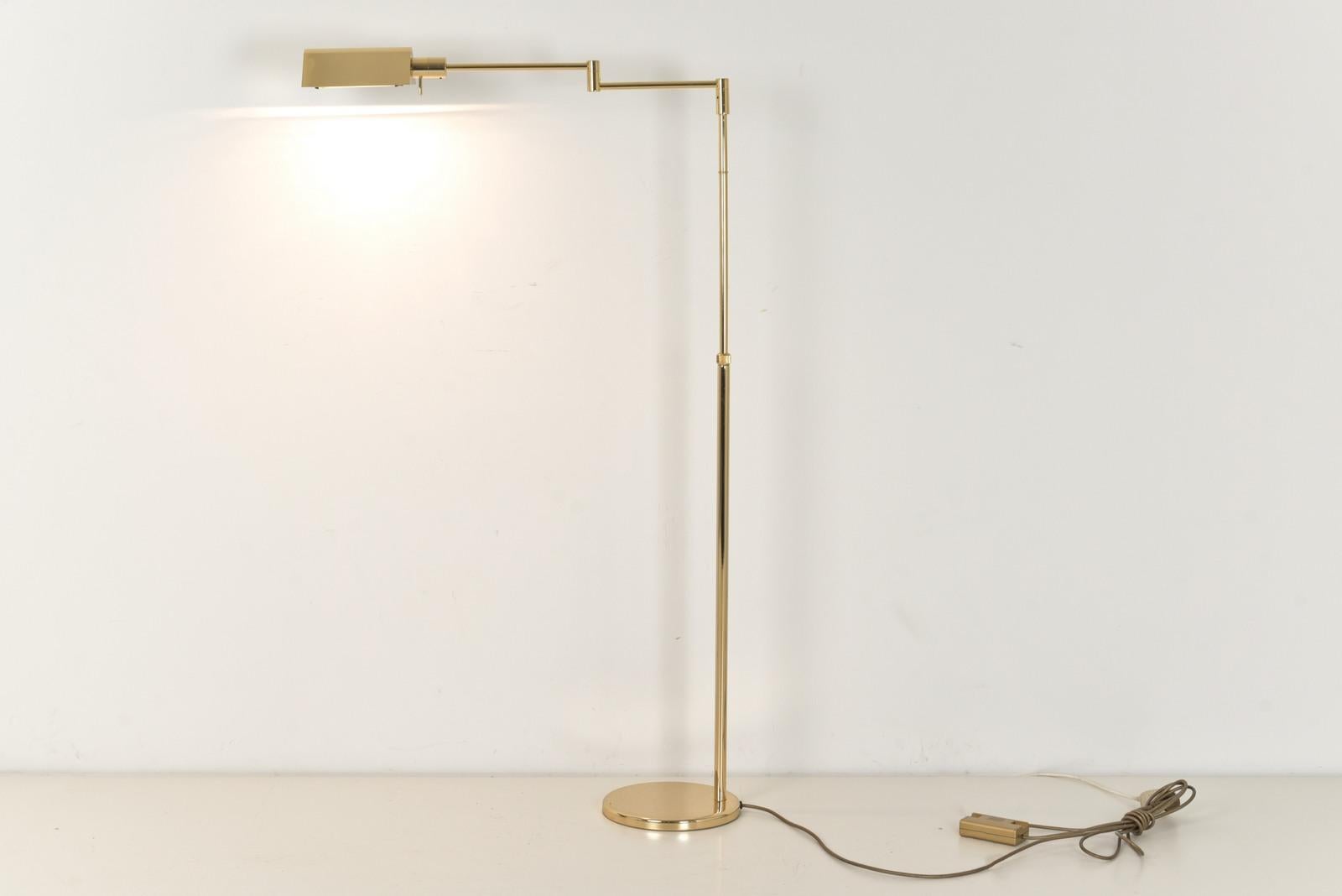 Designer: Factory design

Dimensions: H 104 cm - 148 cm W 78 cm D 25 cm

Material: Brass high-gloss polished and protective lacquered, golden connection cable with cord dimmer, lighting rod halogen 200 watt behind protective glass.

Condition: Good