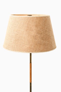 Floor Lamp in Brass, Cane and Original Shade by Paavo Tynell, 1950's