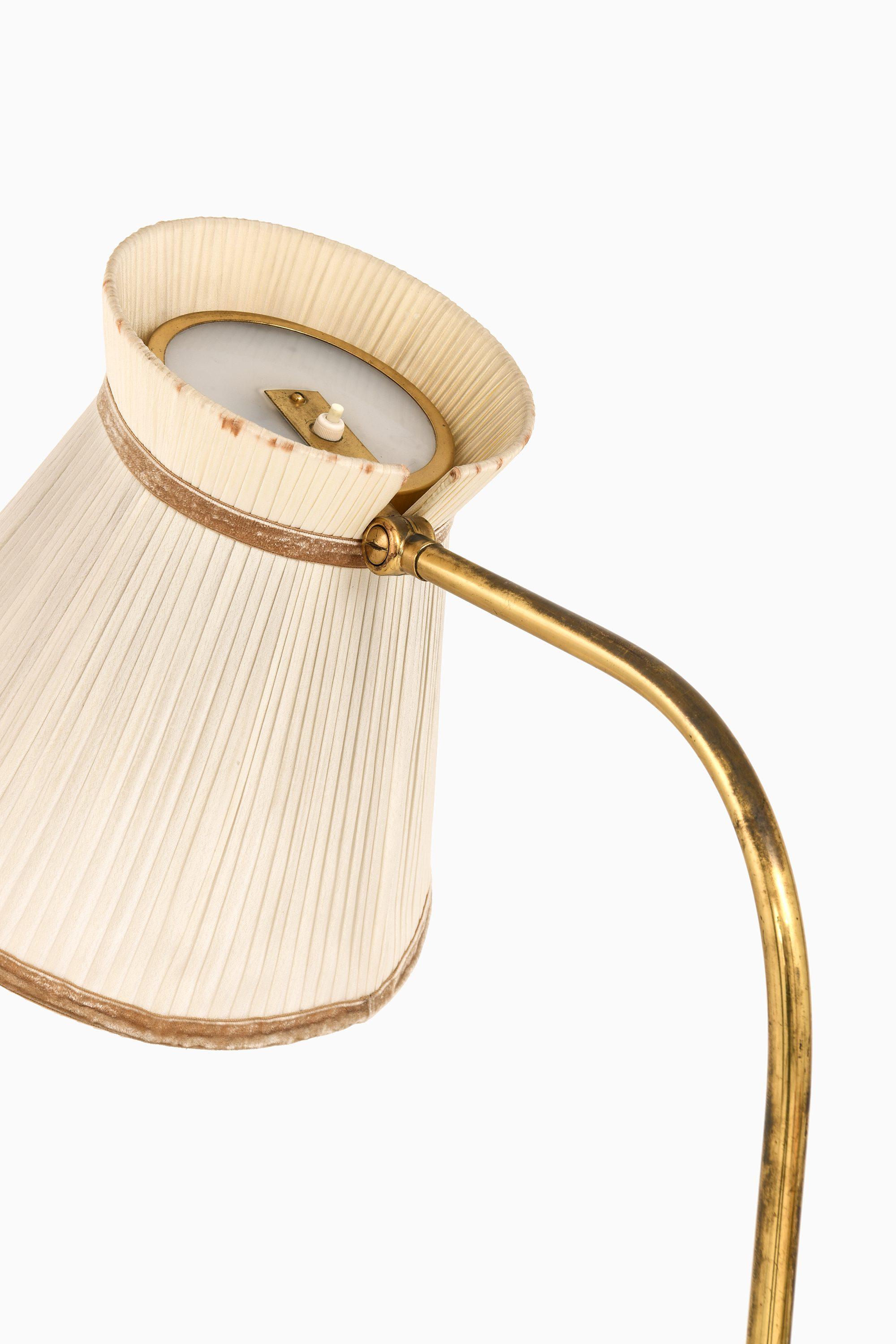 Scandinavian Modern Floor Lamp in Brass, Leather and Linen Shade by Lisa Johansson-Pape, 1940’s For Sale