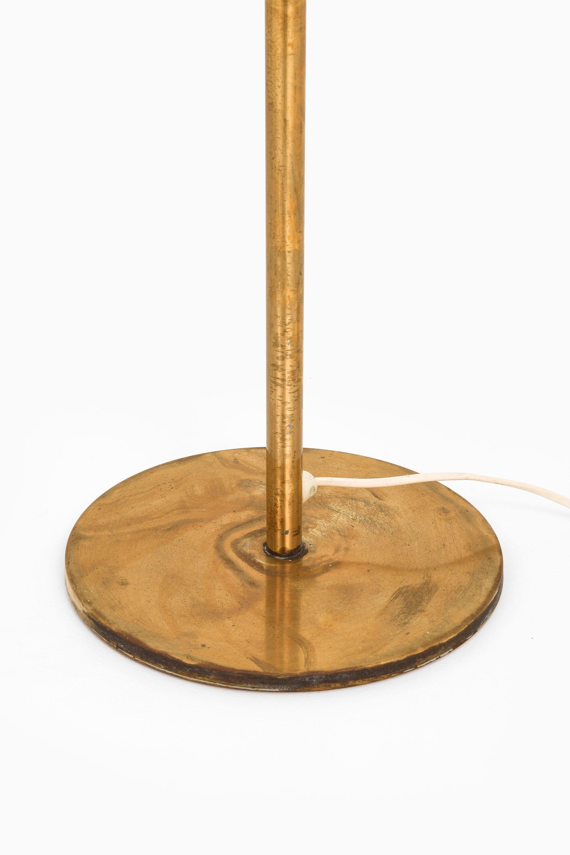 Floor Lamp in Brass, Plastic and Fabric by Uno and Östen Kristiansson, 1960's

Additional Information:
Material: Brass, plastic and fabric
Style: Mid century, Scandinavian
Produced by Luxus in Vittsjö, Sweden
Dimensions (W x D x H): 38 x 38 x 139.5